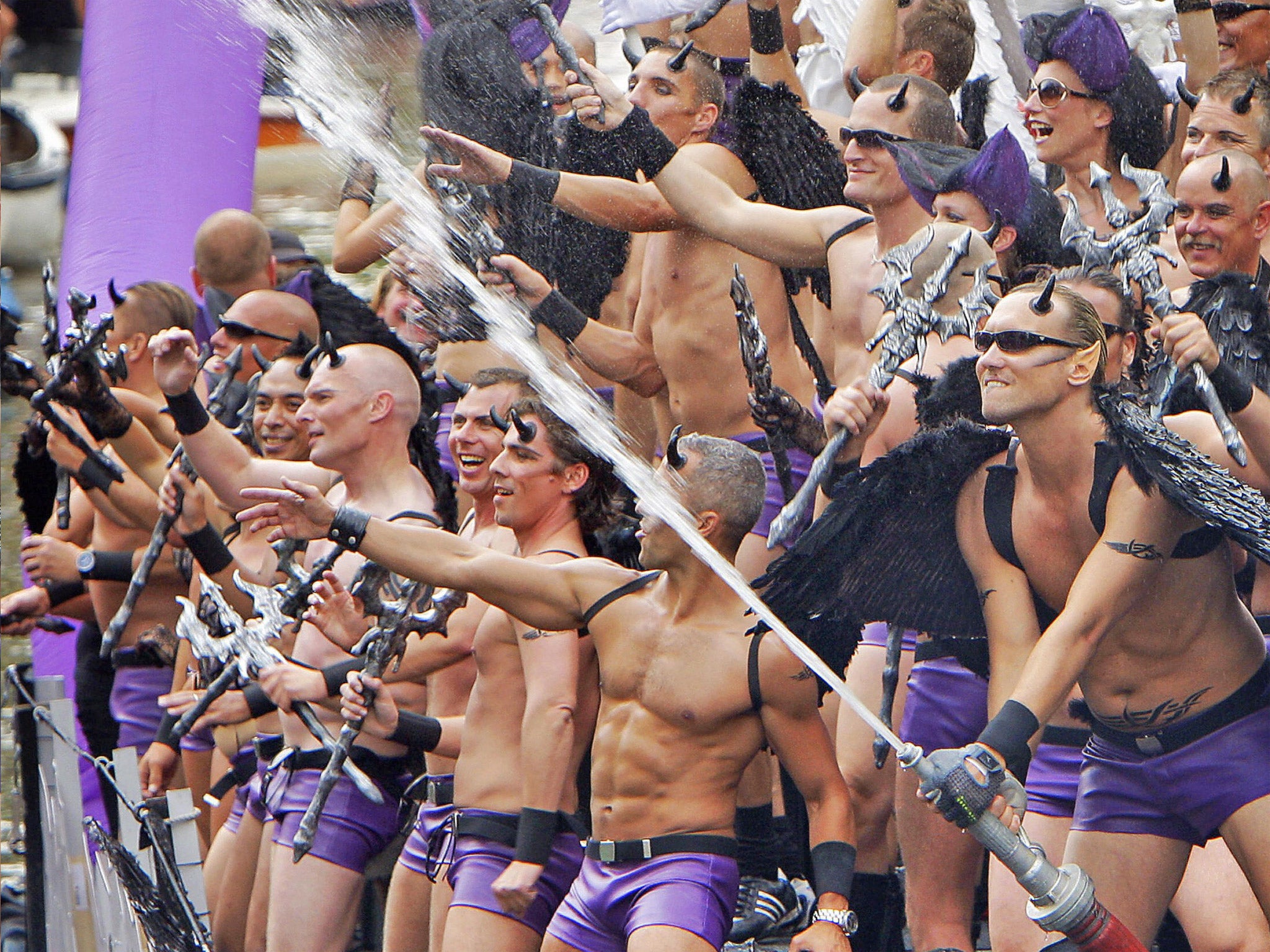 Revellers in Amsterdam’s Canal Parade