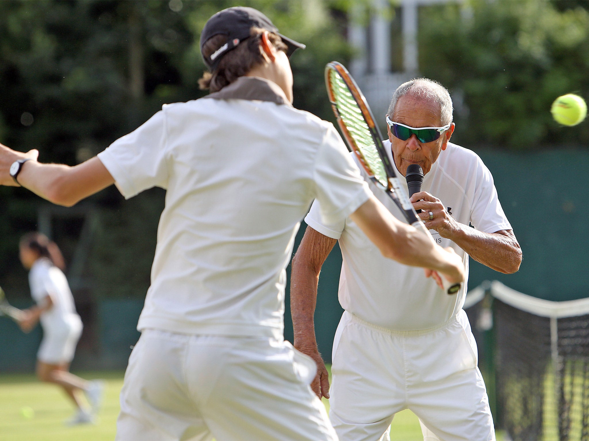 Nick Bollettieri coaches youngsters at the Cumberland Tennis Club in Hampstead, London