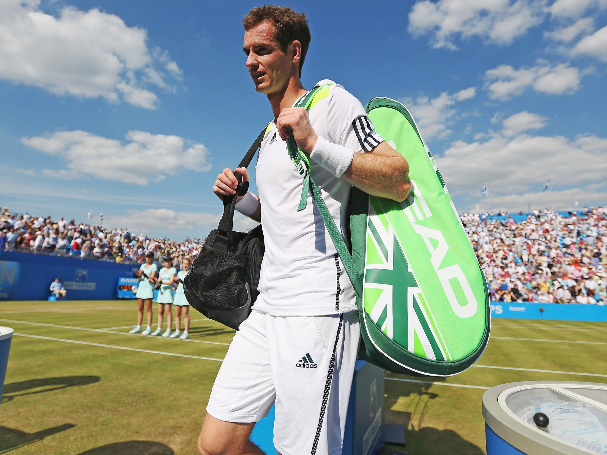 Andy Murray leaves the court following his defeat against Radek Stepanek at Queens last week