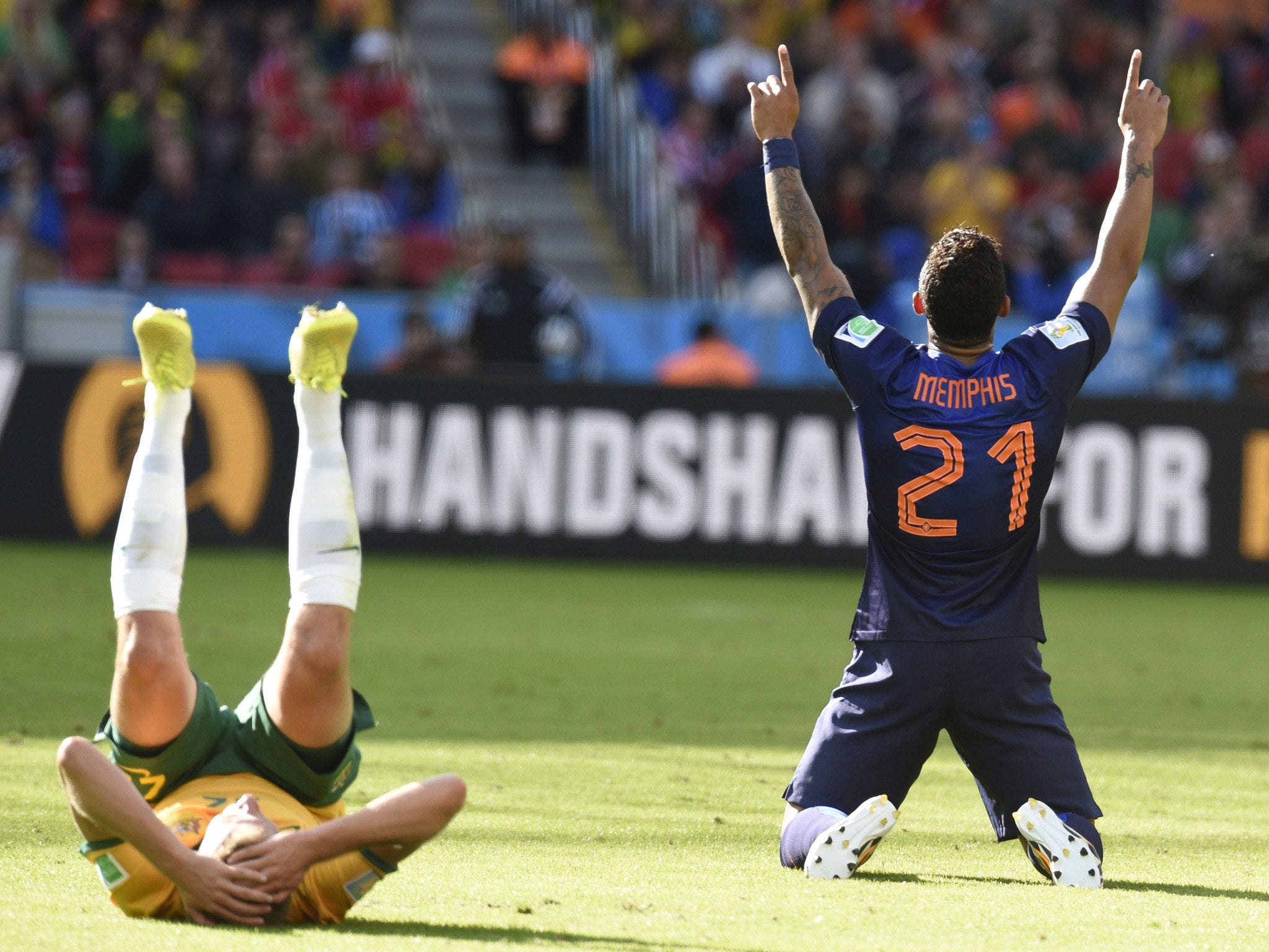 Netherlands' forward Memphis Depay celebrates after scoring against Australia