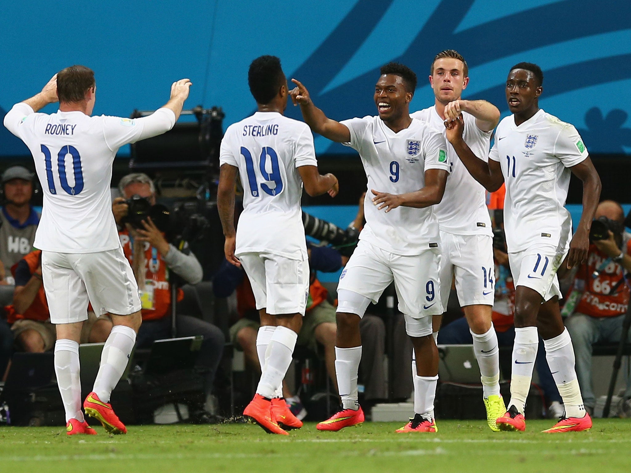 Daniel Sturridge of England (C) celebrates scoring his team's first goal with Wayne Rooney (L), Raheem Sterling (2nd L), Jordan Henderson (2nd R) and Danny Welbeck (R)