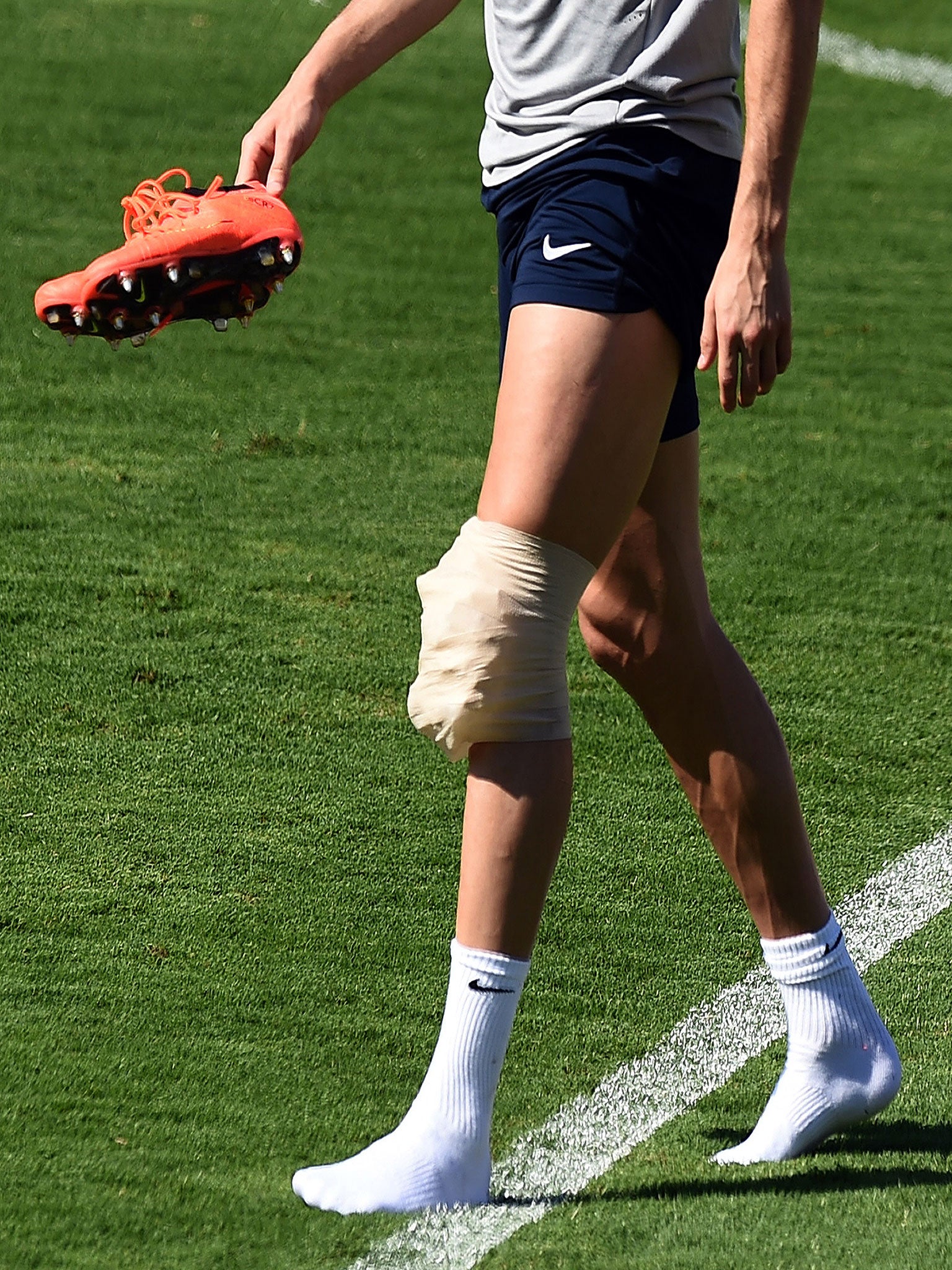 Cristiano Ronaldo's knee was heavily-strapped in bandage in training ahead of the USA game