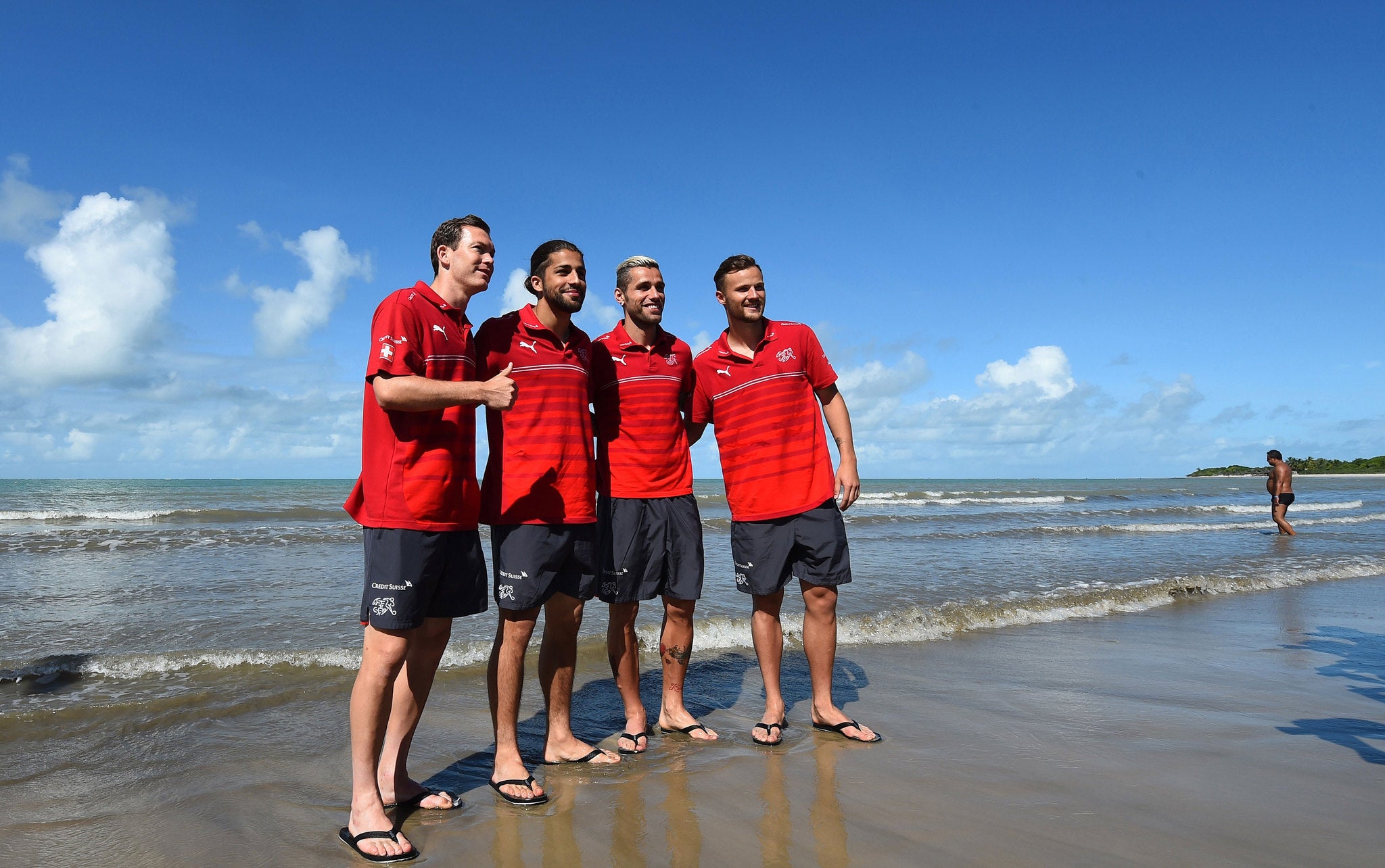 Stephan Licthsteiner, RIcardo Rodriguez, Valon Behrami and Haris Seferovic (left to right) pose on the beach in Porto Seguro