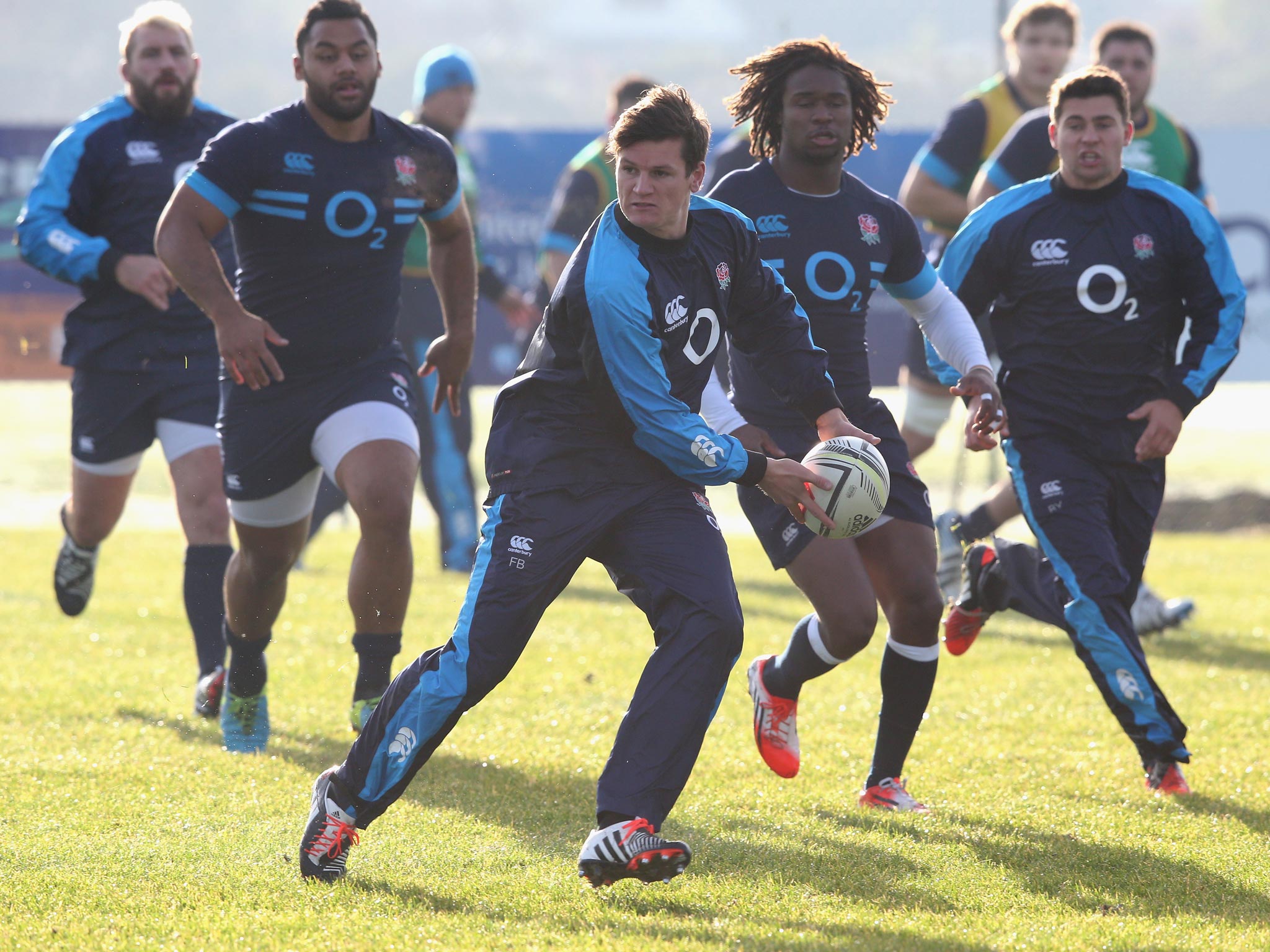 Freddie Burns passes the ball during England training
yesterday