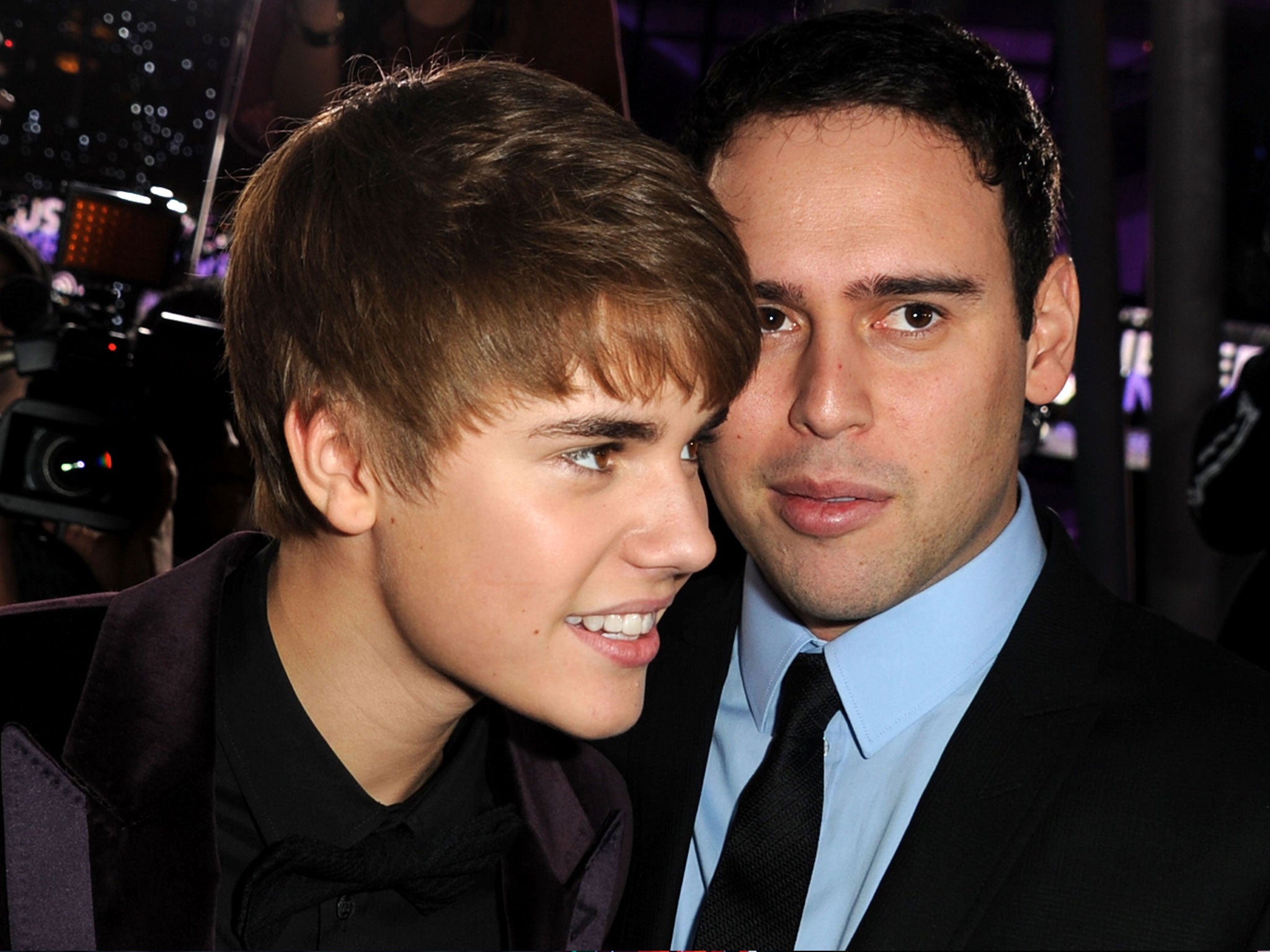 Justin Bieber and manager Scooter Braun arrive at the premiere of Paramount Pictures' ‘Justin Bieber: Never Say Never' in Los Angeles 2011