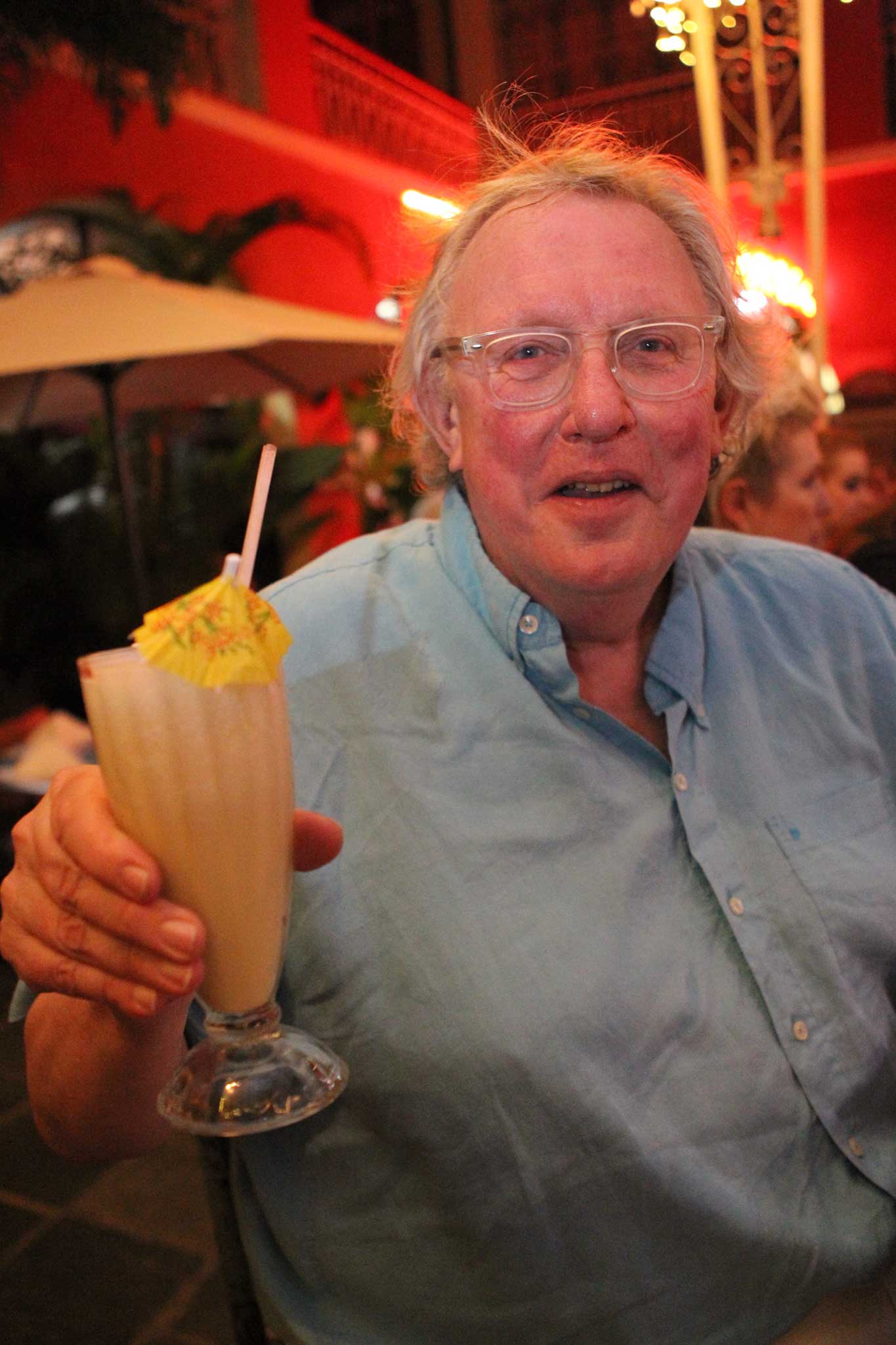 Happy reunion: Christopher poses with his piña colada