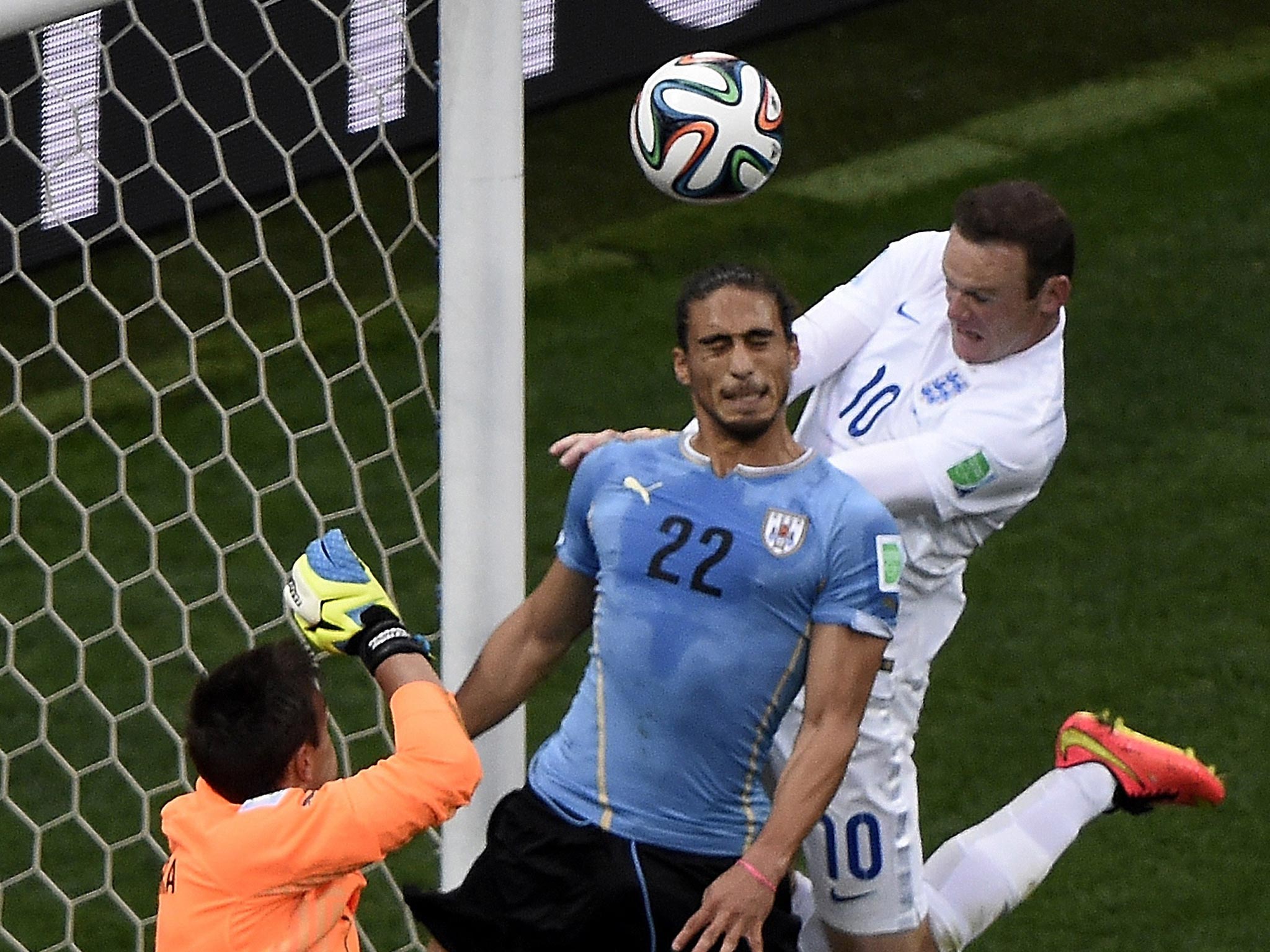 Wayne Rooney heads against the bar on a day when he could have had a hat-trick