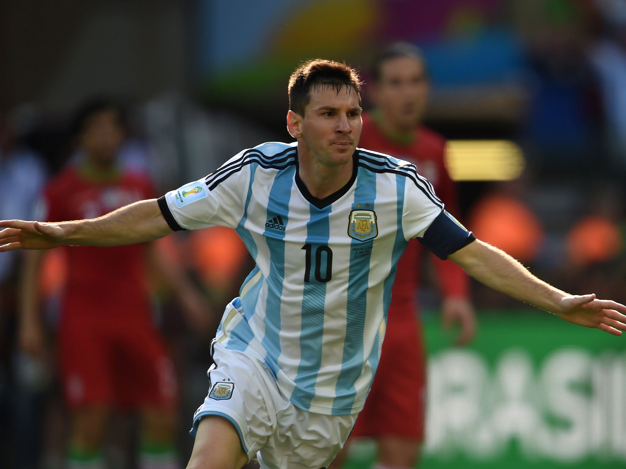 Lionel Messi celebrates his winning goal for Argentina