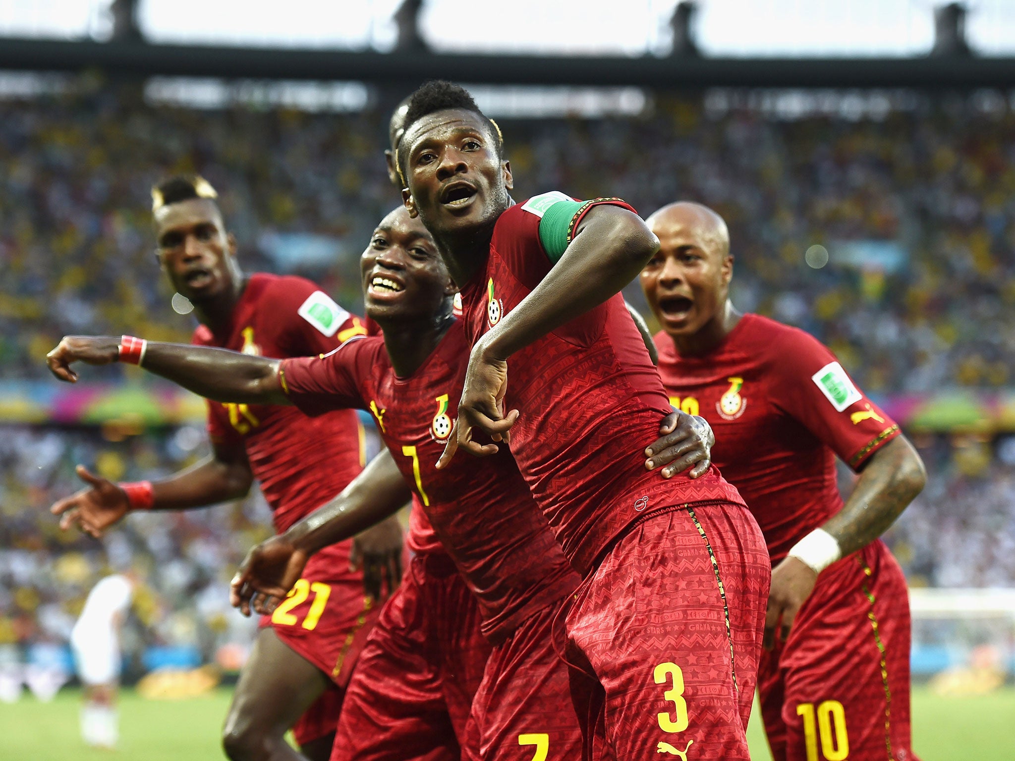 Asamoah Gyan dances in celebration with his team-mates after scoring Ghana’s second goal against Germany in the dramatic 2-2 draw in Fortaleza