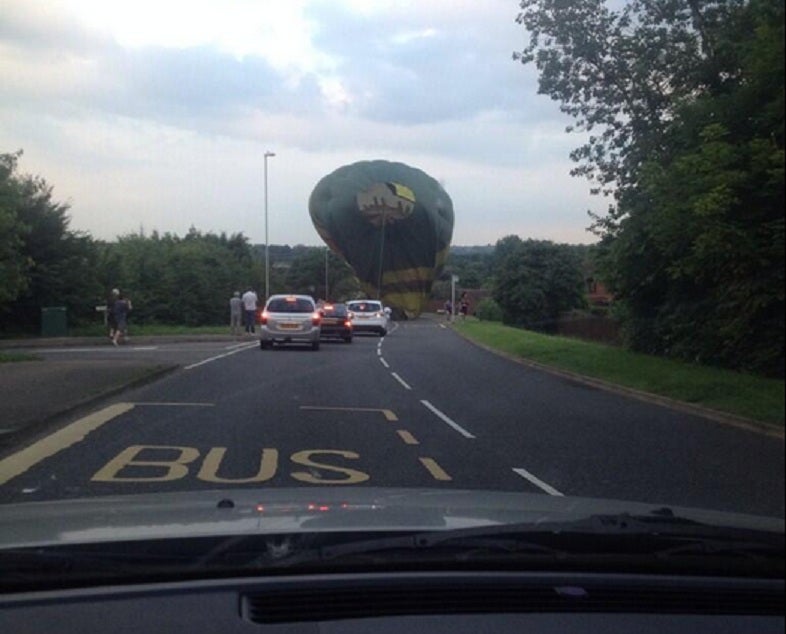 Police helped clear away the balloon