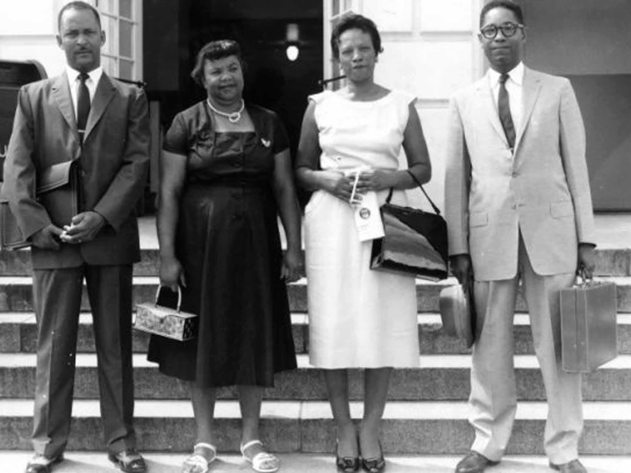 Sarah Mae Flemming (second from left) with attorneys and a witness in her case