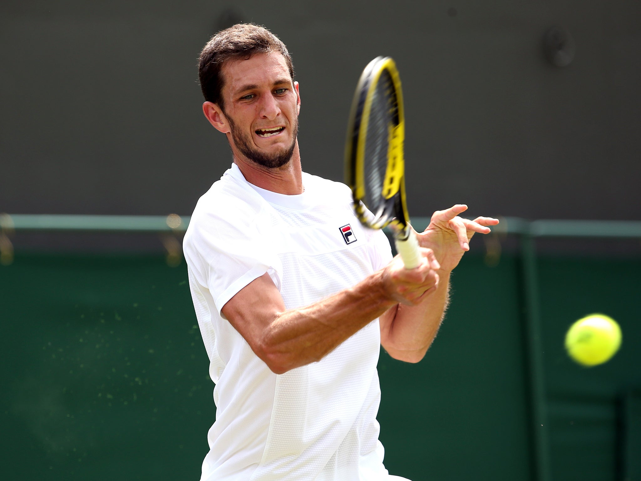 James Ward in action at Wimbledon