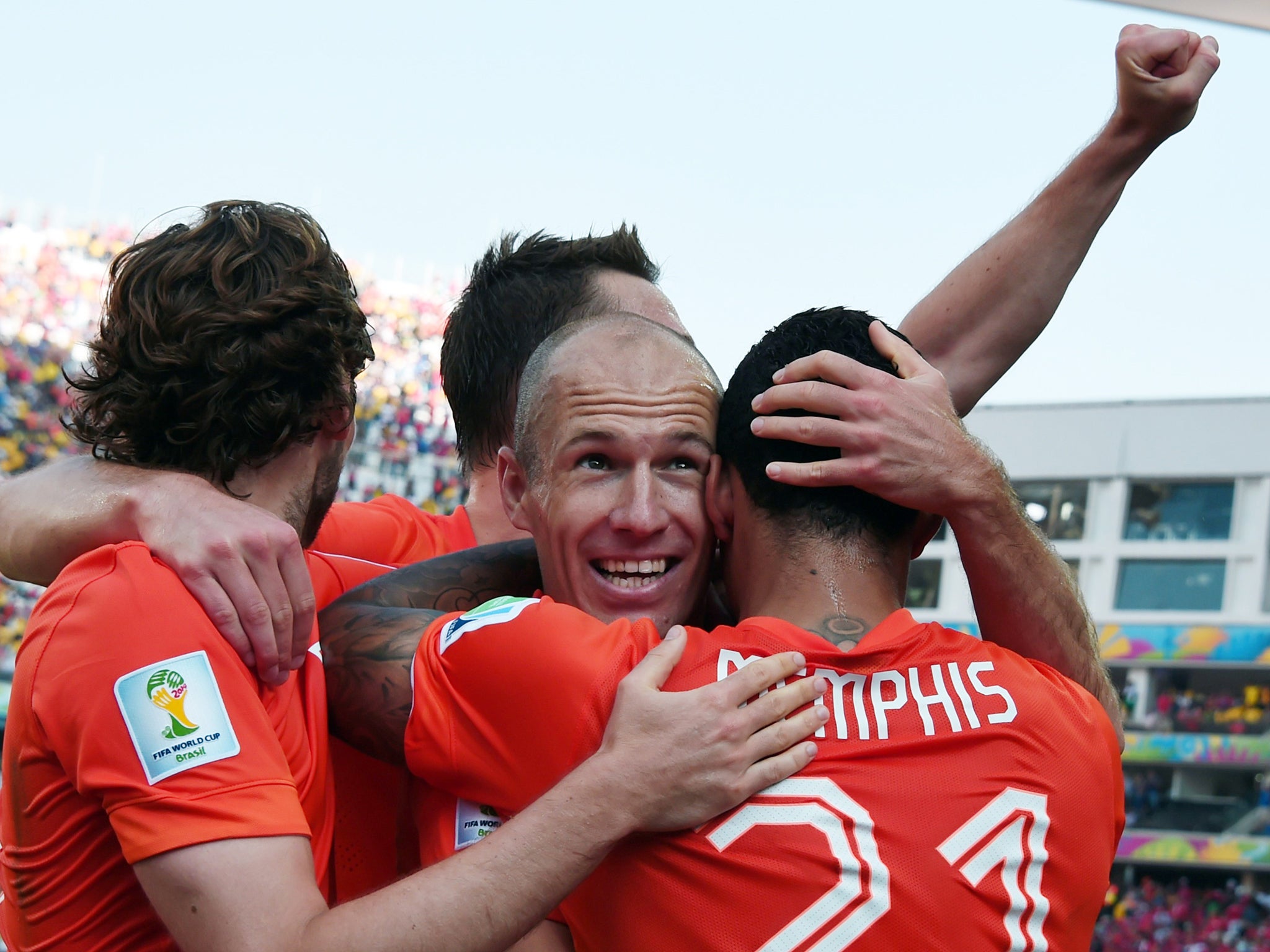 Netherlands celebrate their second goal against Chile