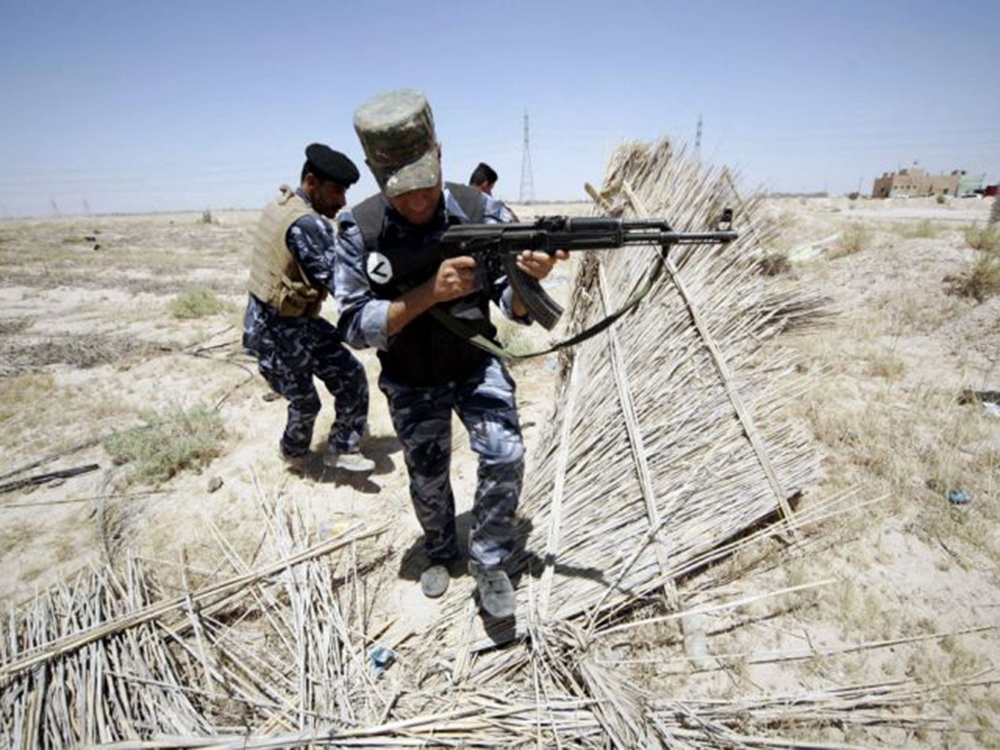 Iraqi soldiers patrolling an area on the borders between Iraq and Saudi Arabia. Isis fighters entered Rutba, a town in Anbar province near the border with Jordan after government troops abandoned their posts