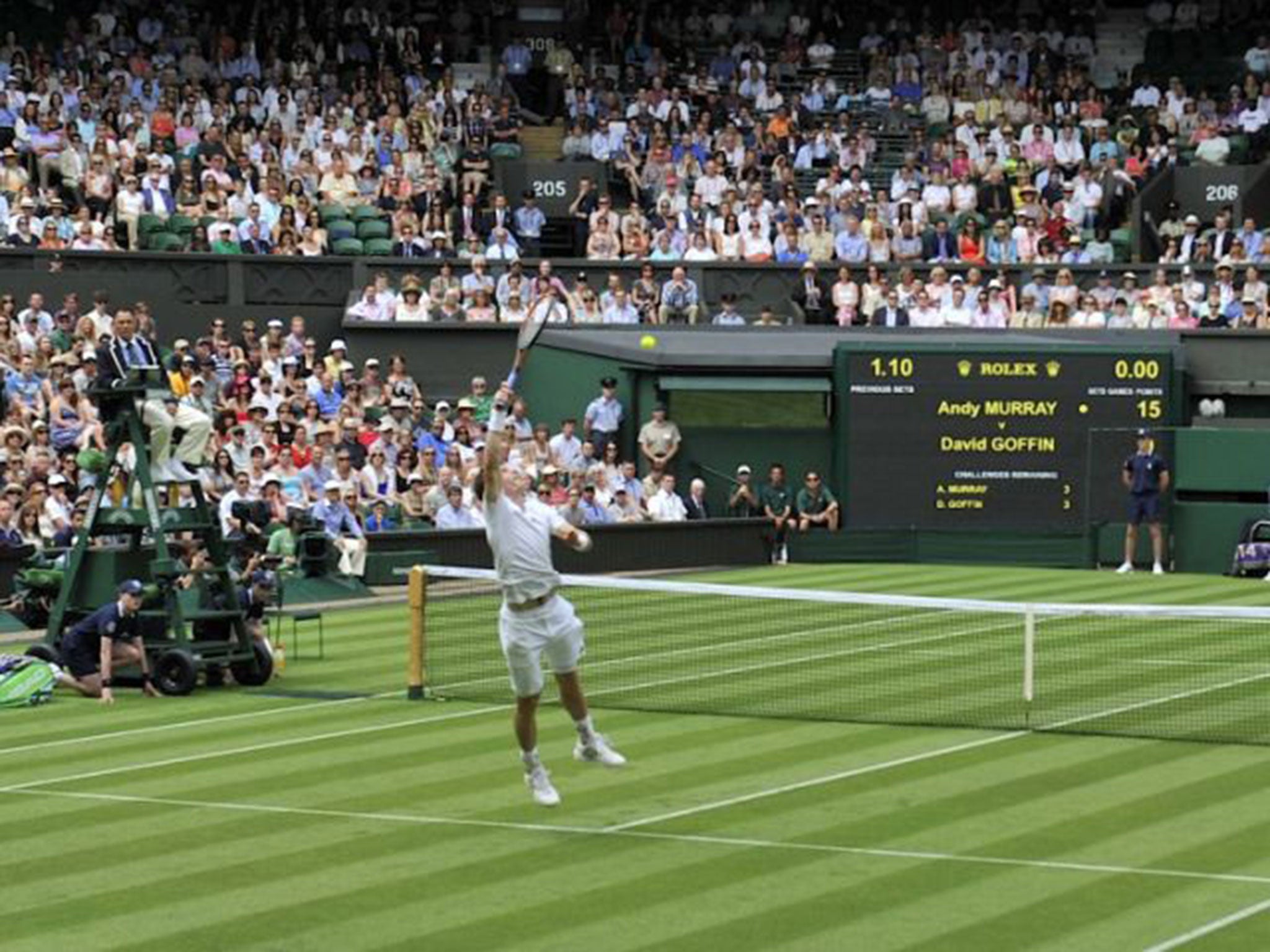 Andy Murray began the defence of his Wimbledon title on Centre Court