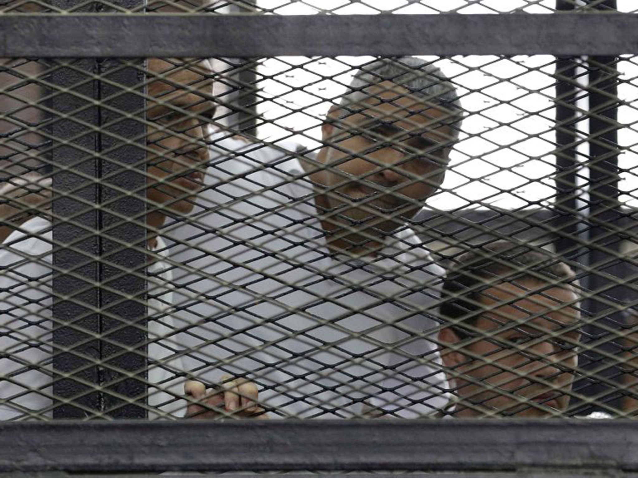 Journalists Peter Greste, left, Mohamed Fahmy,centre, and Baher Mohamed were yesterday jailed for aiding a terrorist organisation. William Hague described the trial as ‘unacceptable’
