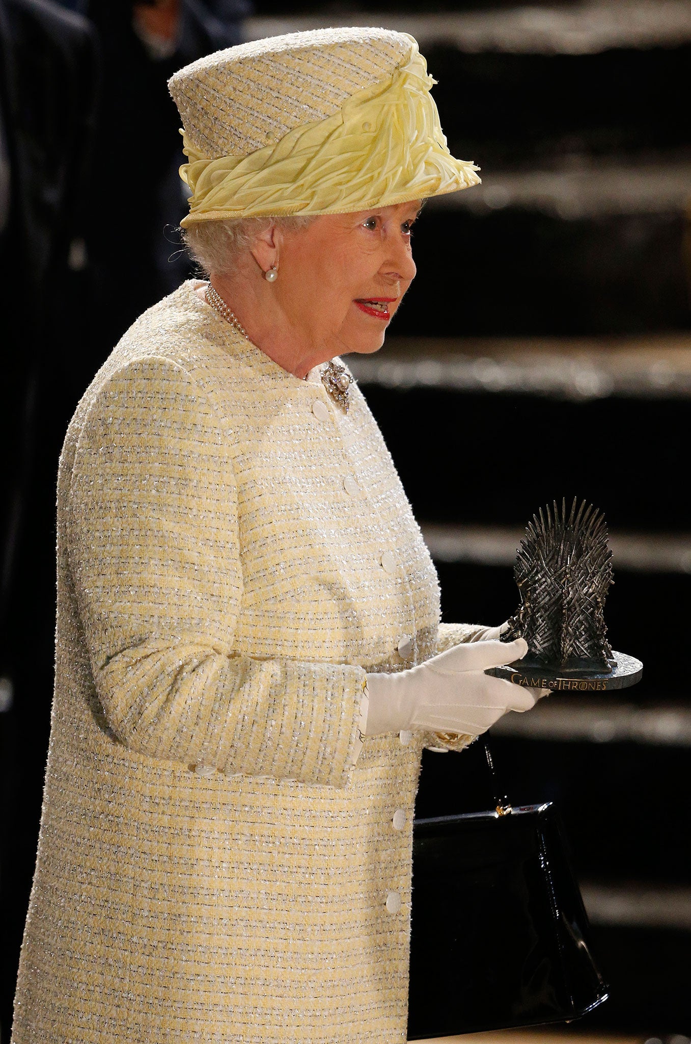 The Queen with her mini iron throne