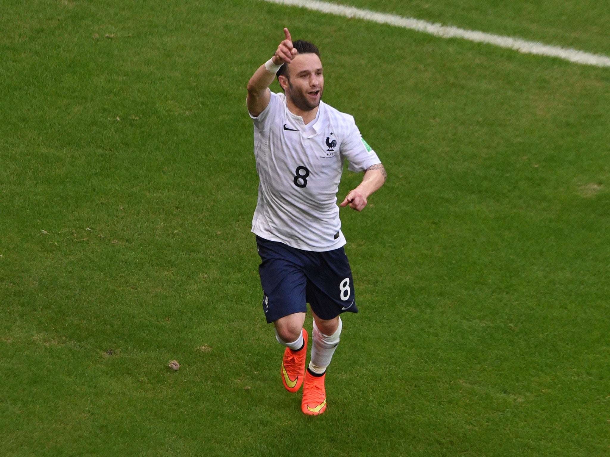 Mathieu Valbuena celebrates scoring for France against Switzerland