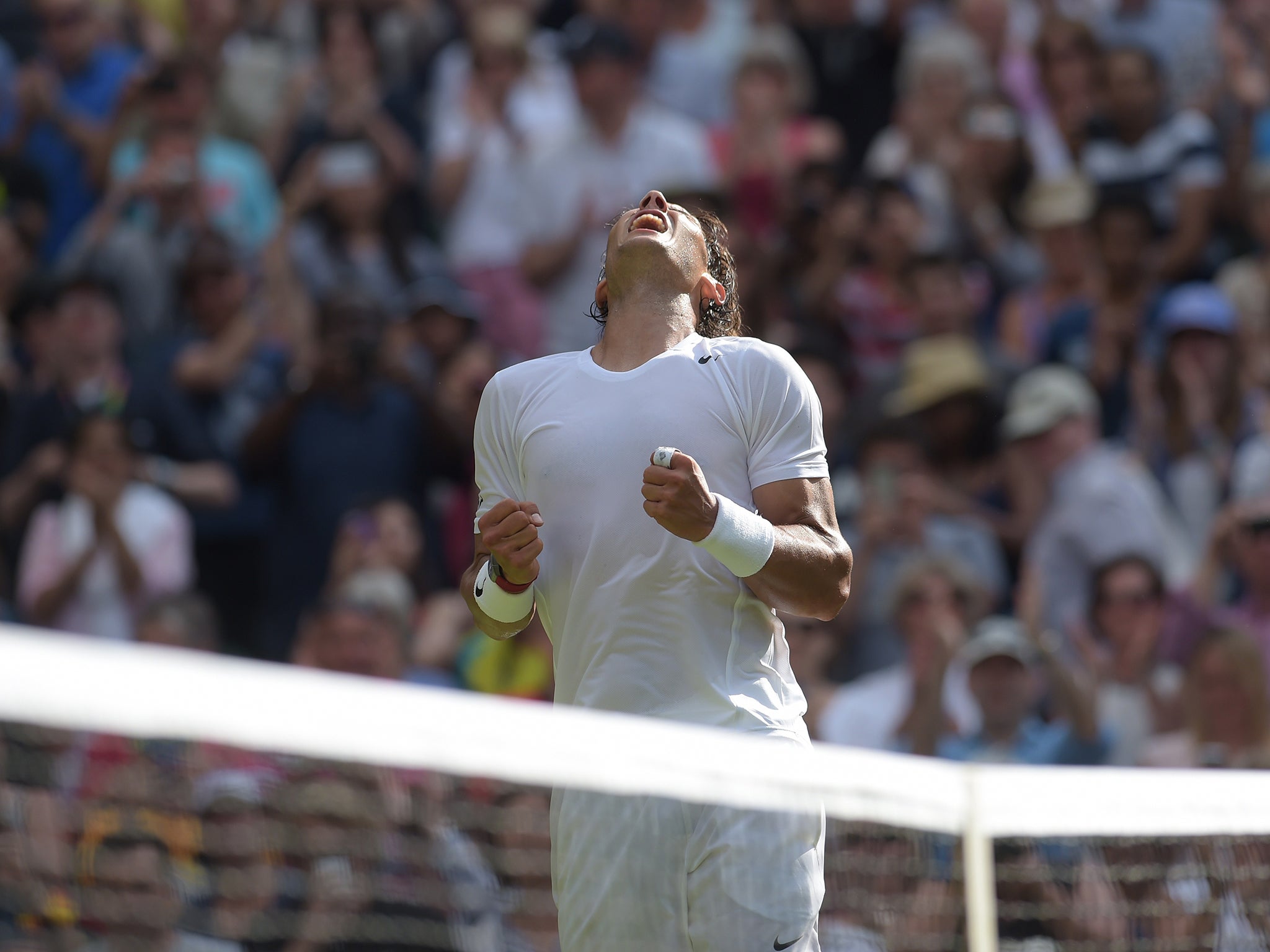 Rafael Nadal celebrates beating Slovakia's Martin Klizan during their men's singles first round match. The Spaniard came through after losing the first set