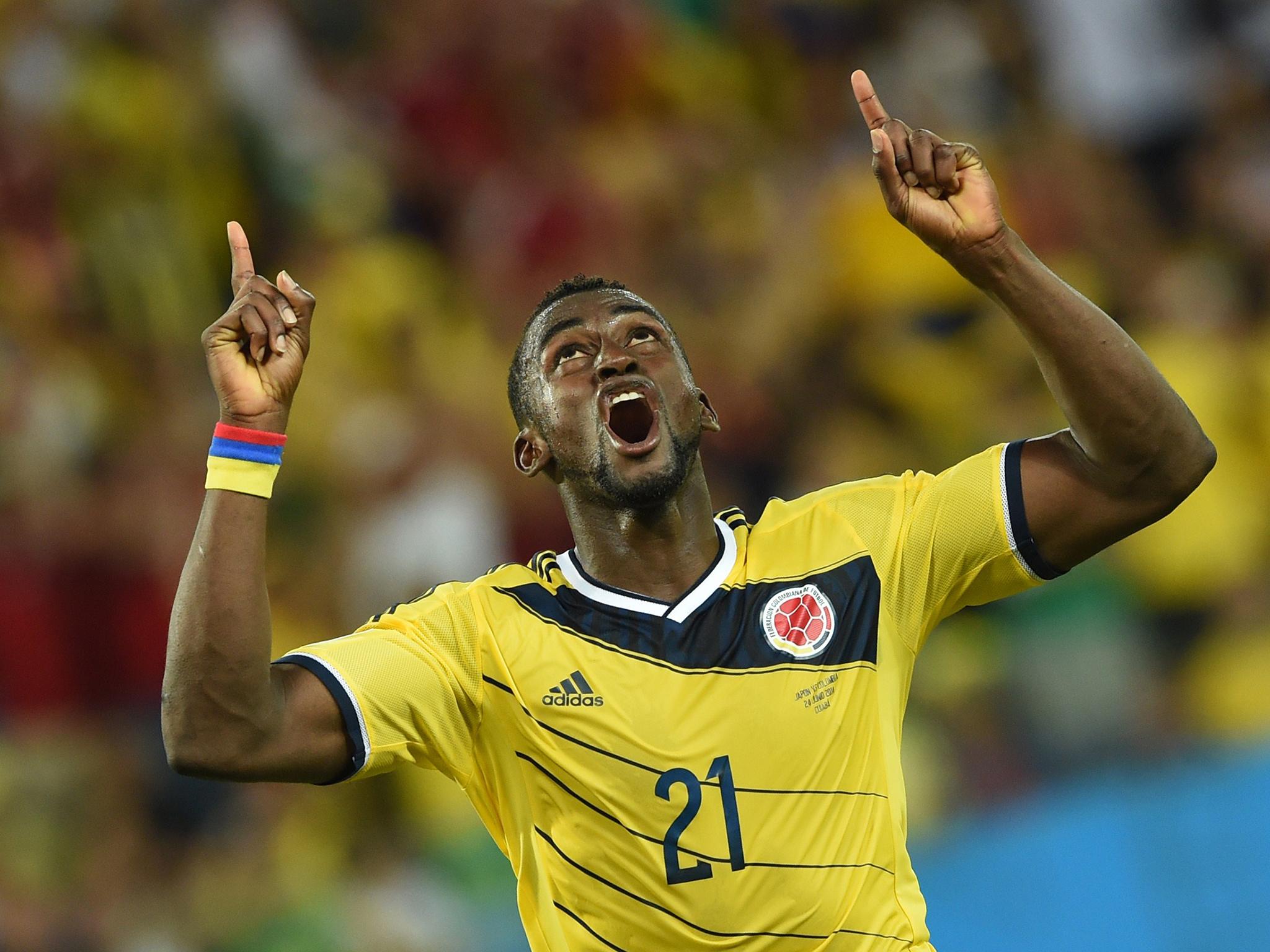 Jackson Martinez celebrates one of his two goals against Japan