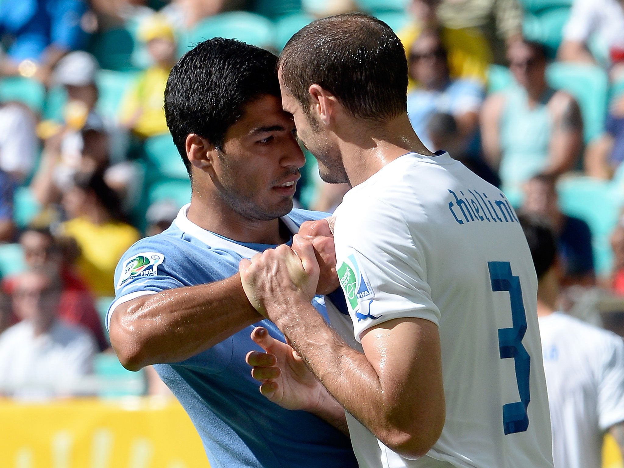 Chiellini confronts Suarez after his 'bite' attempt