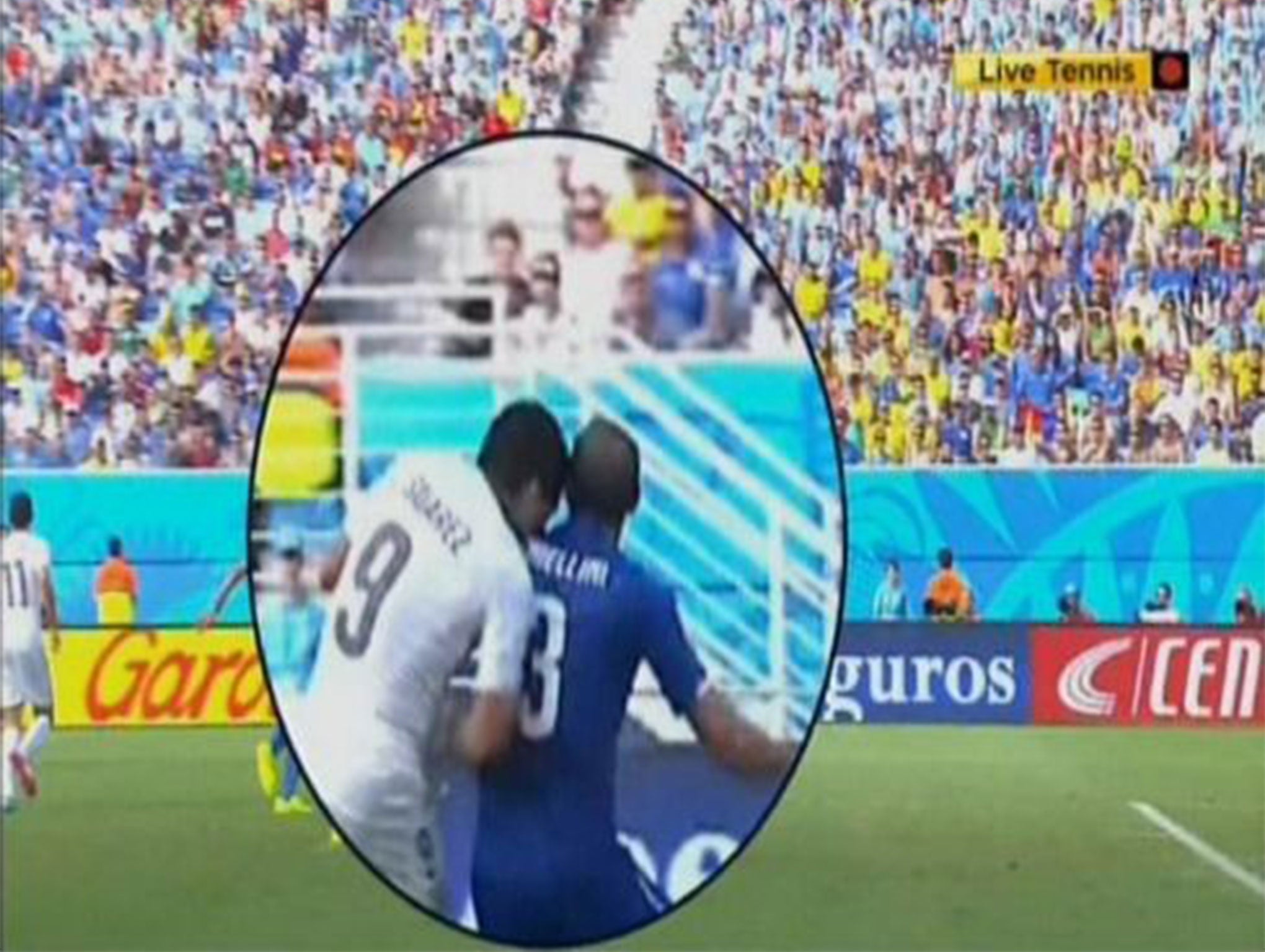 Suarez bites Chiellini