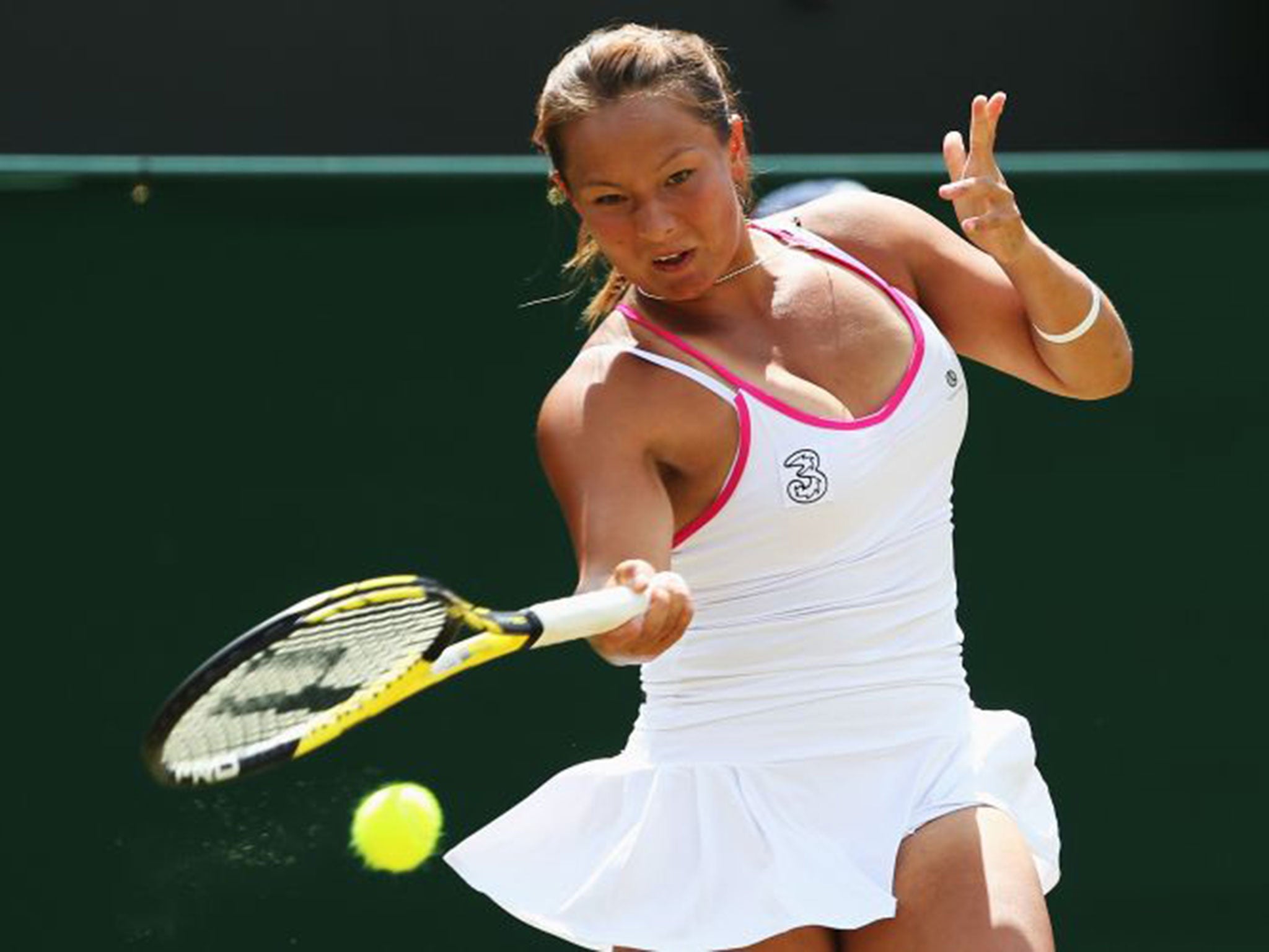 Tara Moore hits a forehand to Vera Zvonareva