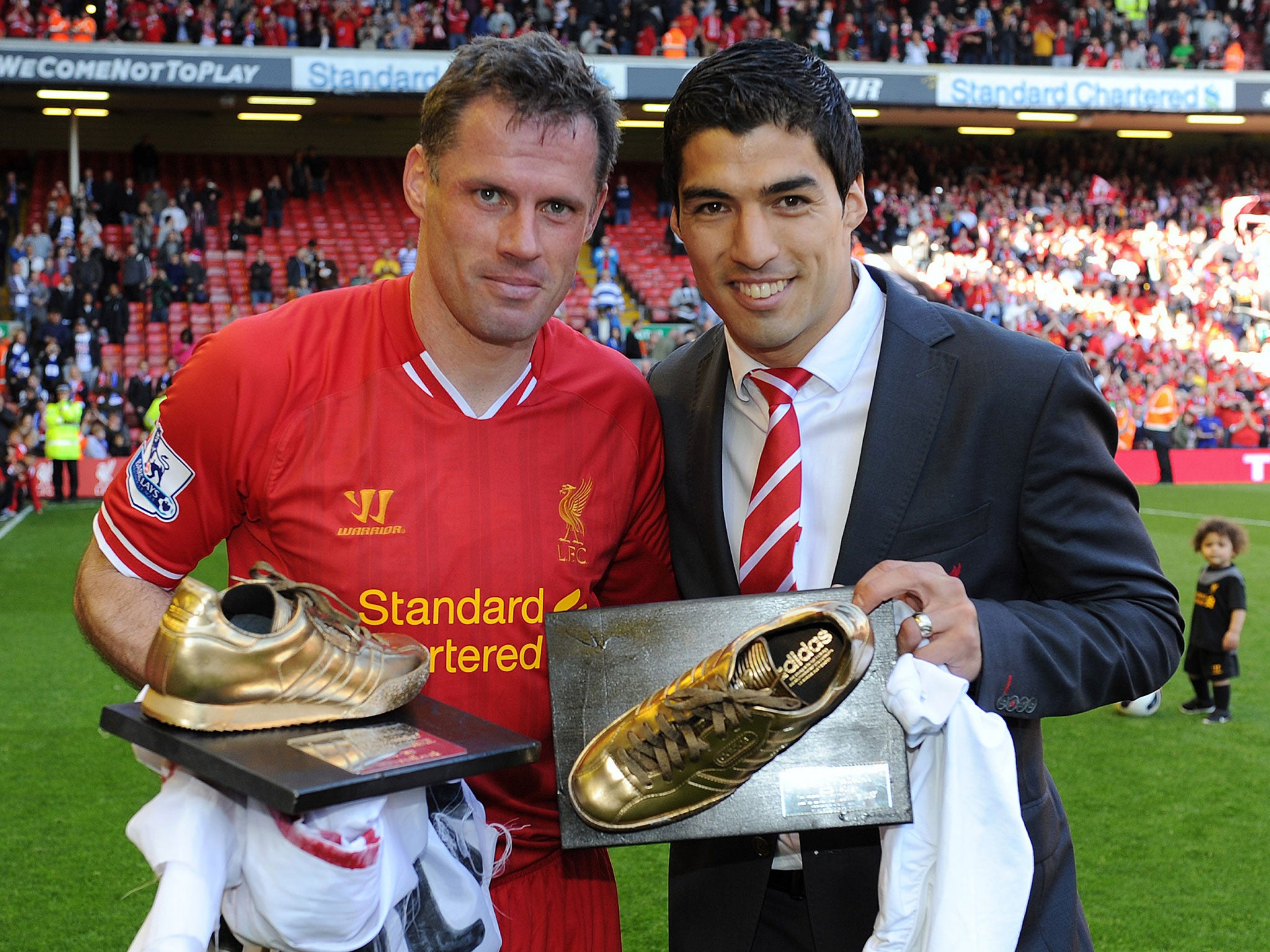 Jamie Carragher and Luis Suarez