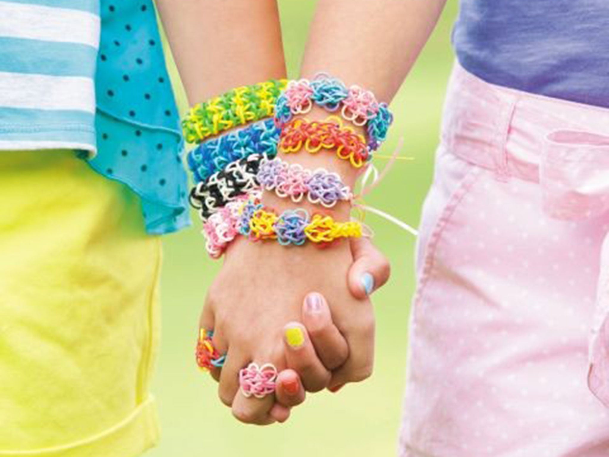 The Rainbow Loom weaves elastics into bracelets