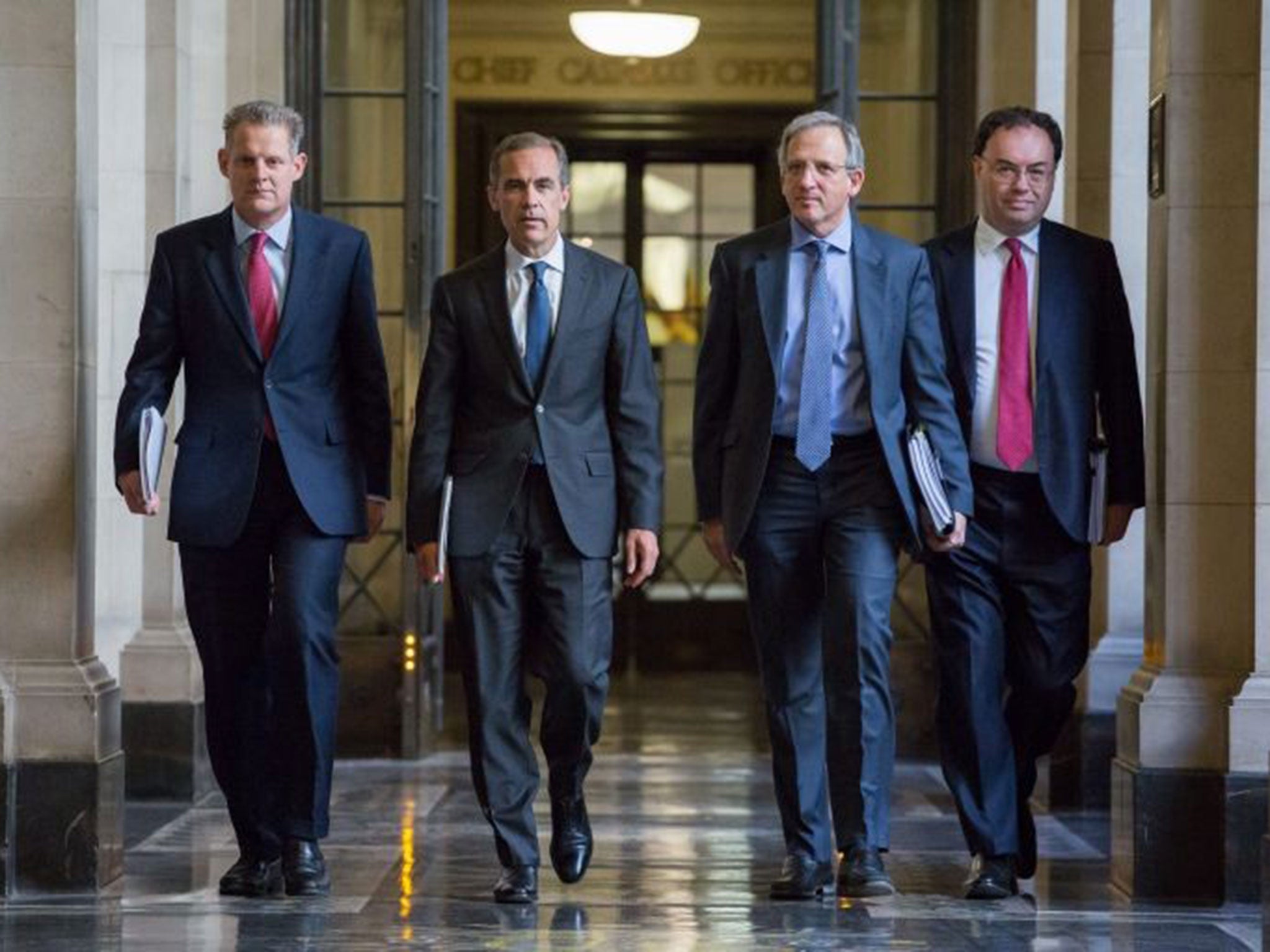 Senior policymakers at the Bank of England (from left) Spencer Dale, Mark Carney, Jon Cunliffe and Andrew Bailey prepare to deliver their report