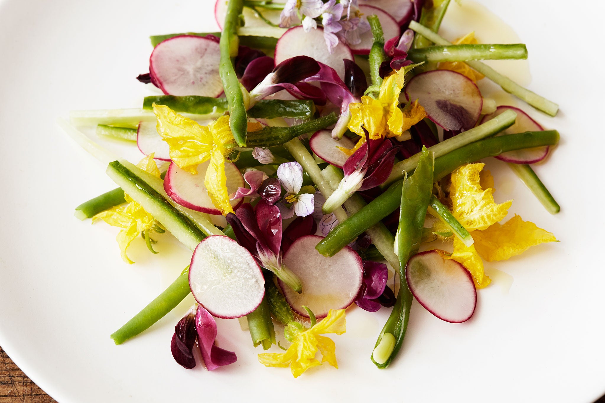 Bean, cucumber, radish and their flowers salad