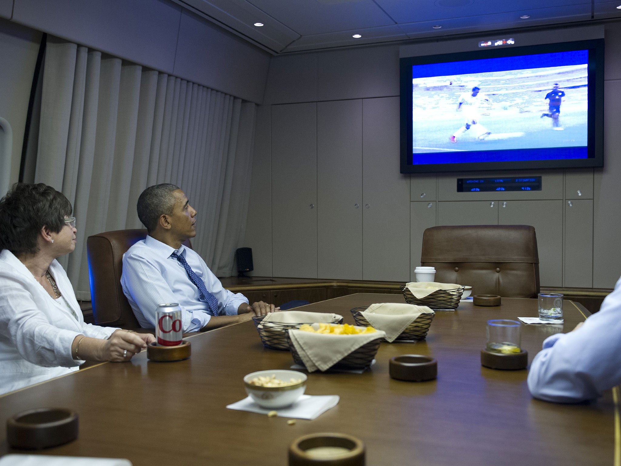 Obama watching the World Cup alongside Senior Advisors Valerie Jarrett (L) and Daniel Pfeiffer (out of shot)