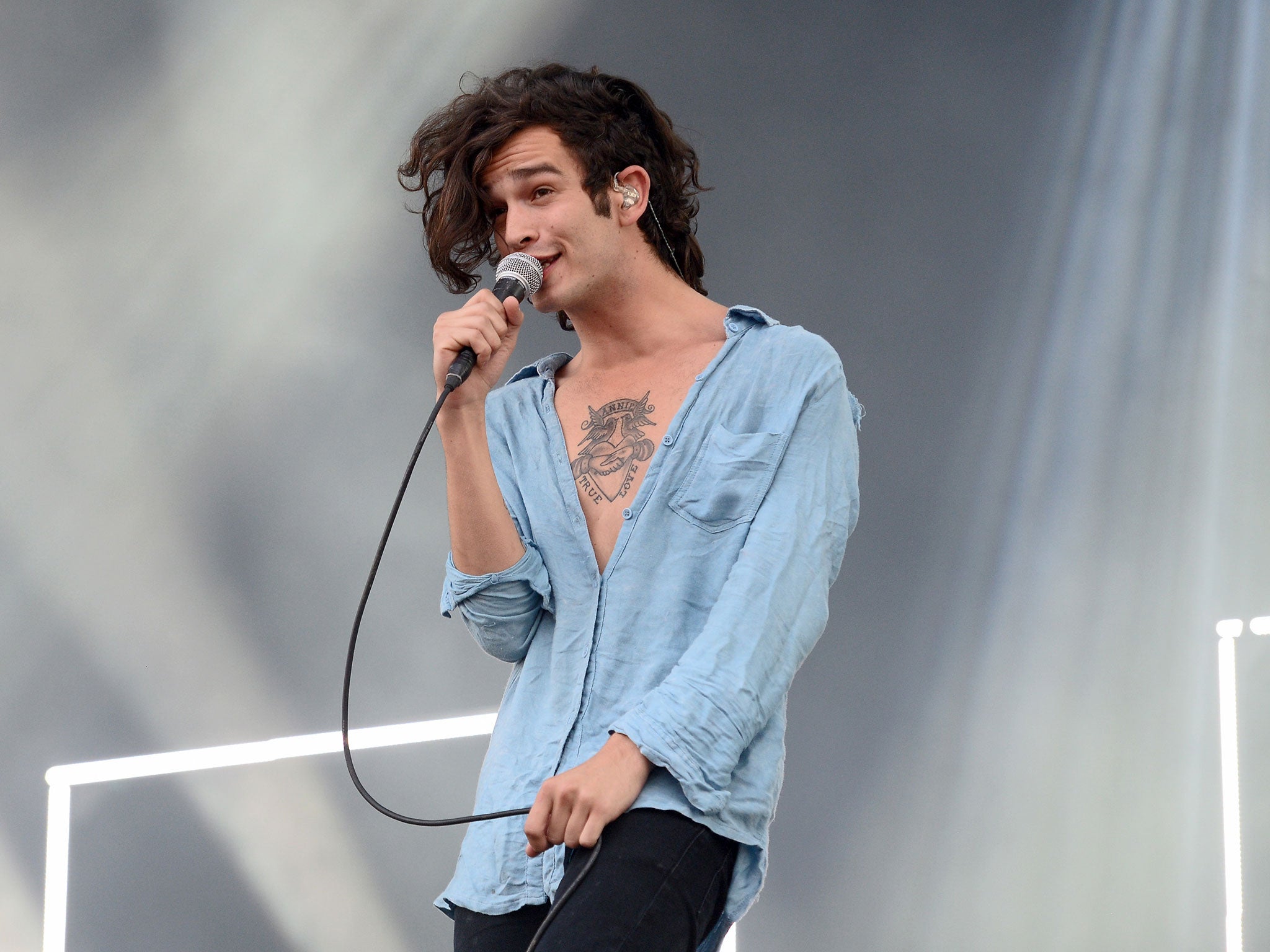 The 1975's Matthew Healy performs at The Isle of Wight Festival at Seaclose Park on 14 June, 2014in Newport, Isle of Wight