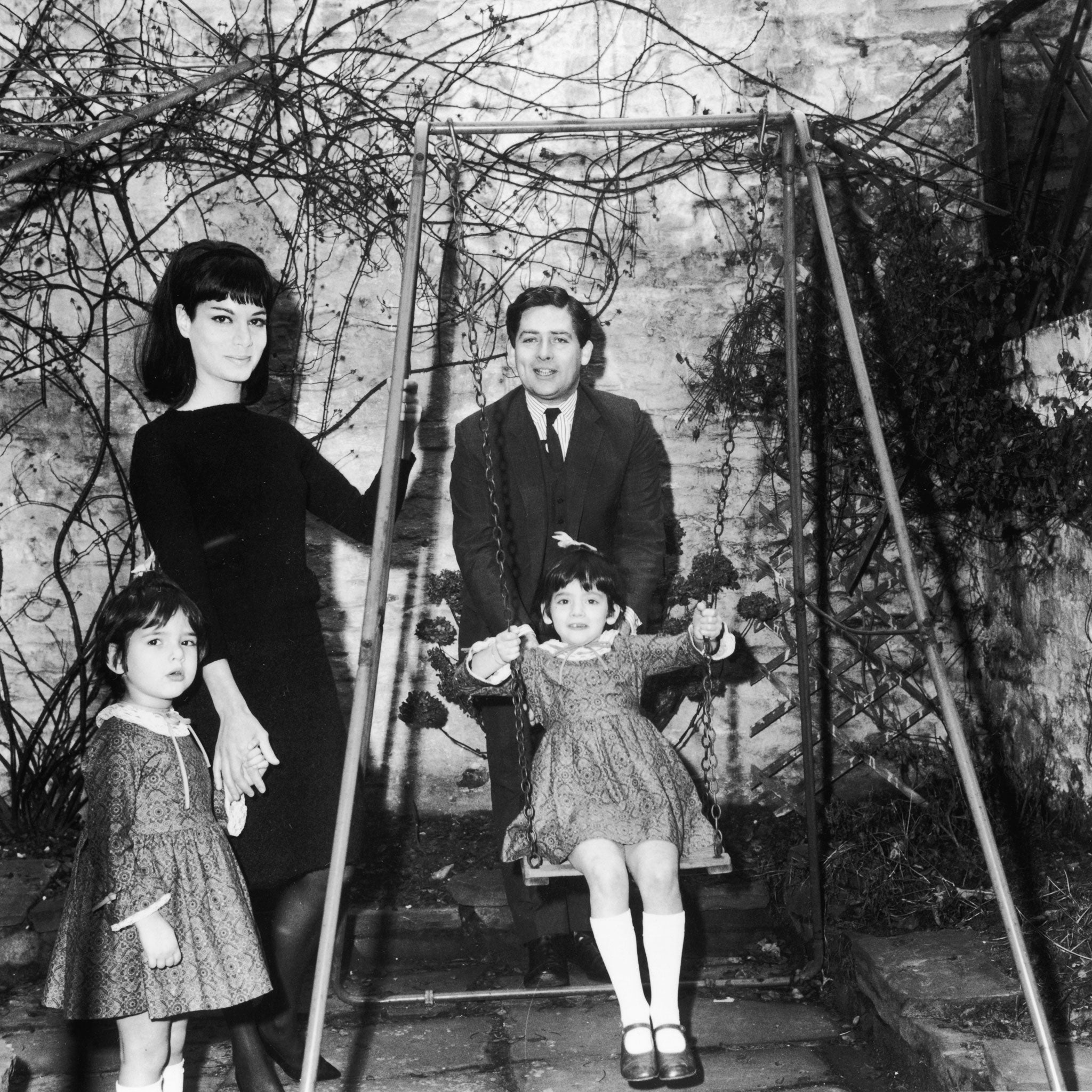 1965: Lawson was a journalist until he entered politics; here, he is seen with his first wife, Vanessa, and two of their daughters; Nigella is on the swing