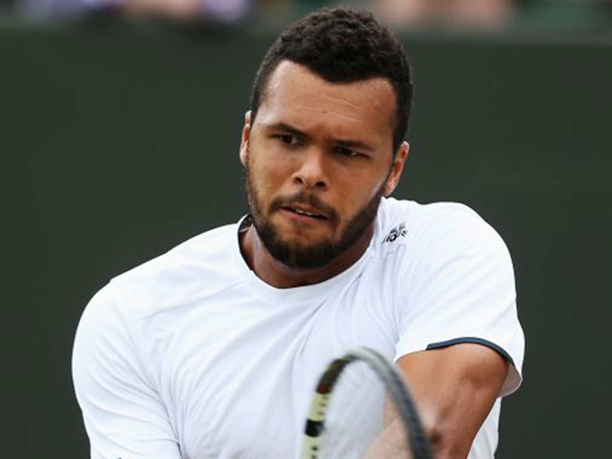 Jo-Wilfried Tsonga beat Jimmy Wang to set up a fourth-round match with Novak Djokovic