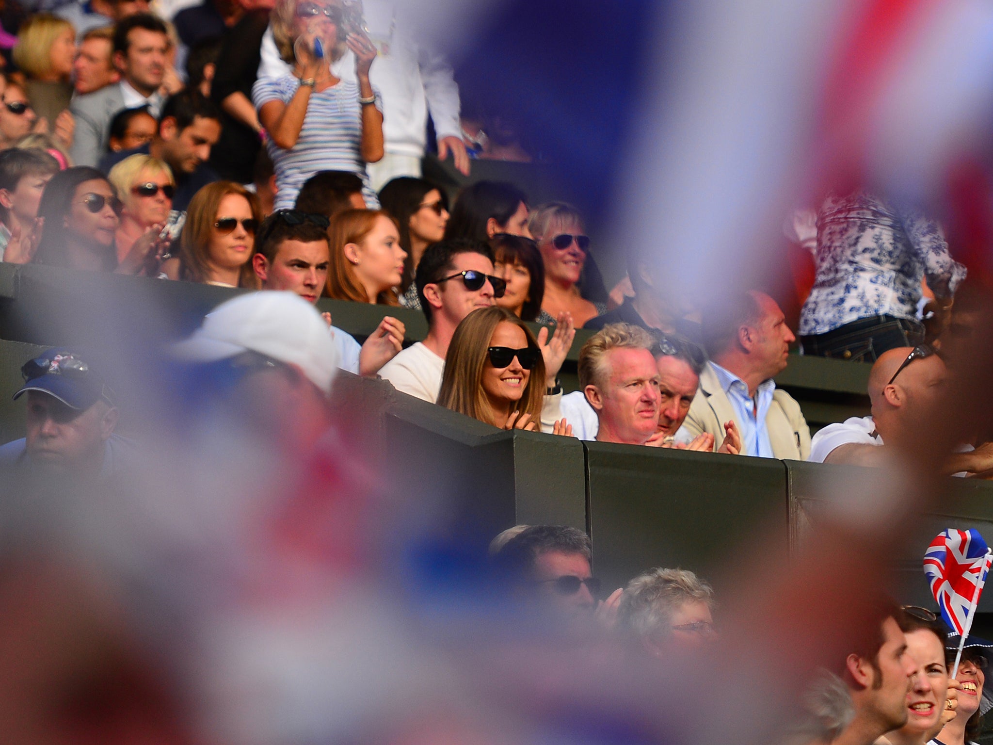 Kim Sears watches Andy Murray in action during his victory over Roberto Bautista