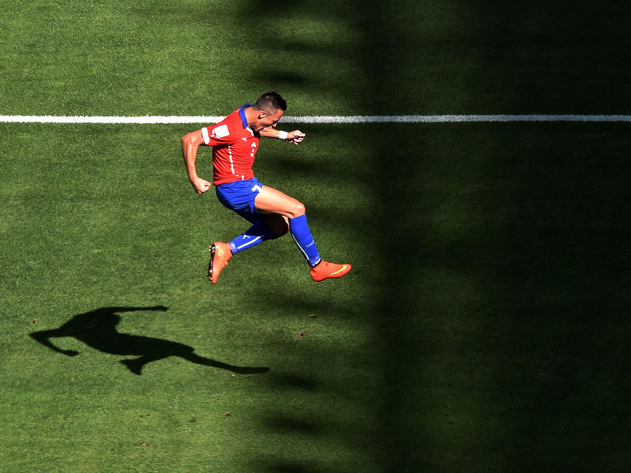 The brilliant Alexis Sanchez celebrates his equaliser for Chile