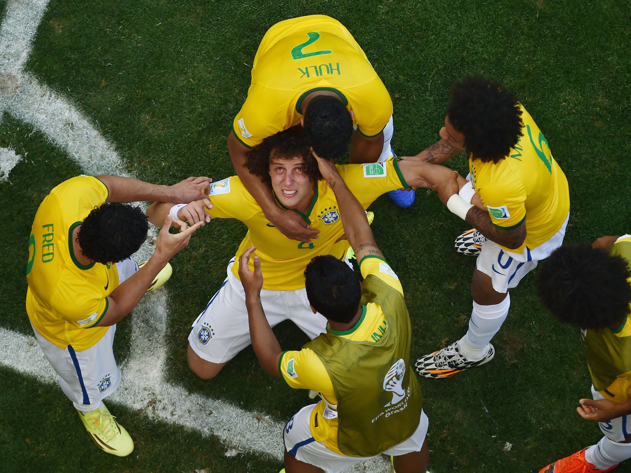 Brazil players celebrate after an own goal had given them the lead in the 18th minute