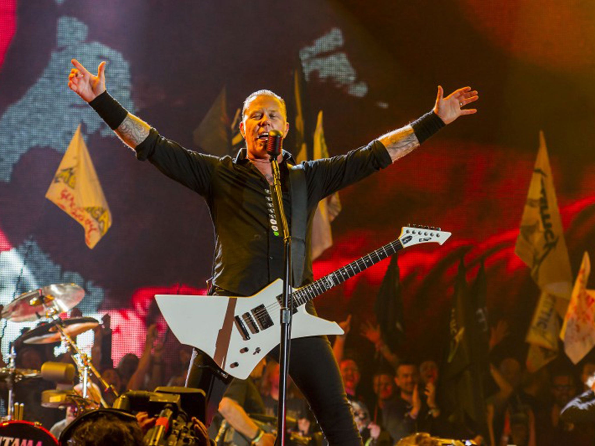 Lead singer James Hetfield saluting the Glastonbury crowds during the band's two hour set