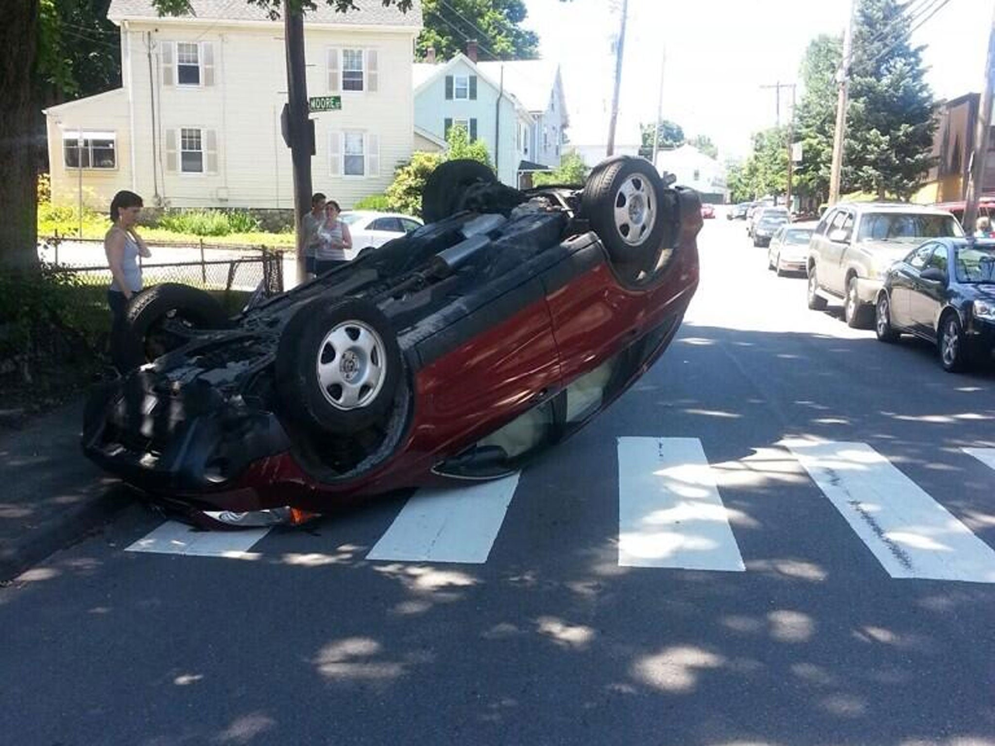 Police tweeted this picture of the car post-flip. Those involved only suffered 'very minor injuries'