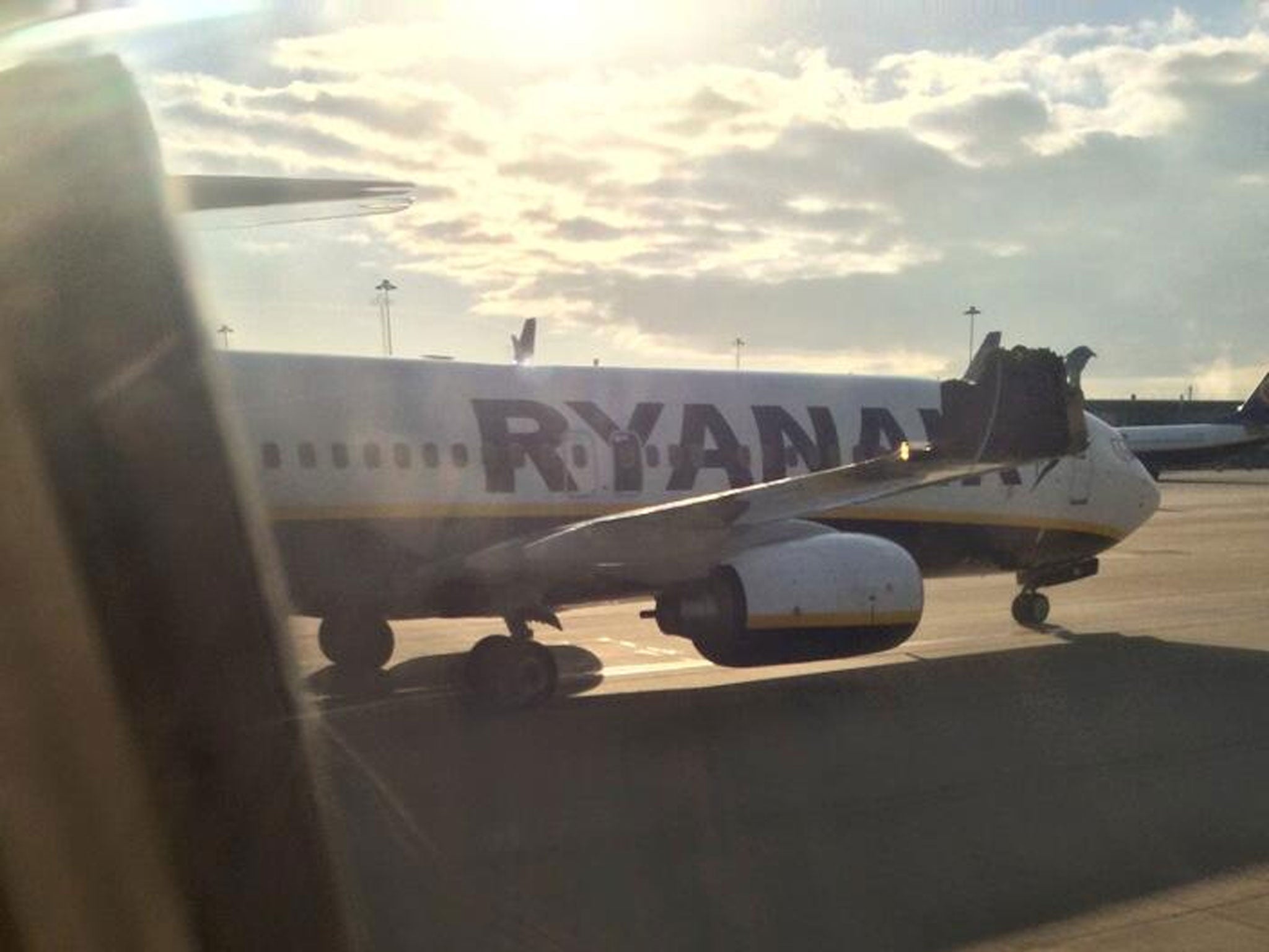 Twitter user Ren Ivaldi took pictures of the damage from his seat and on the ground once passengers had been disembarked