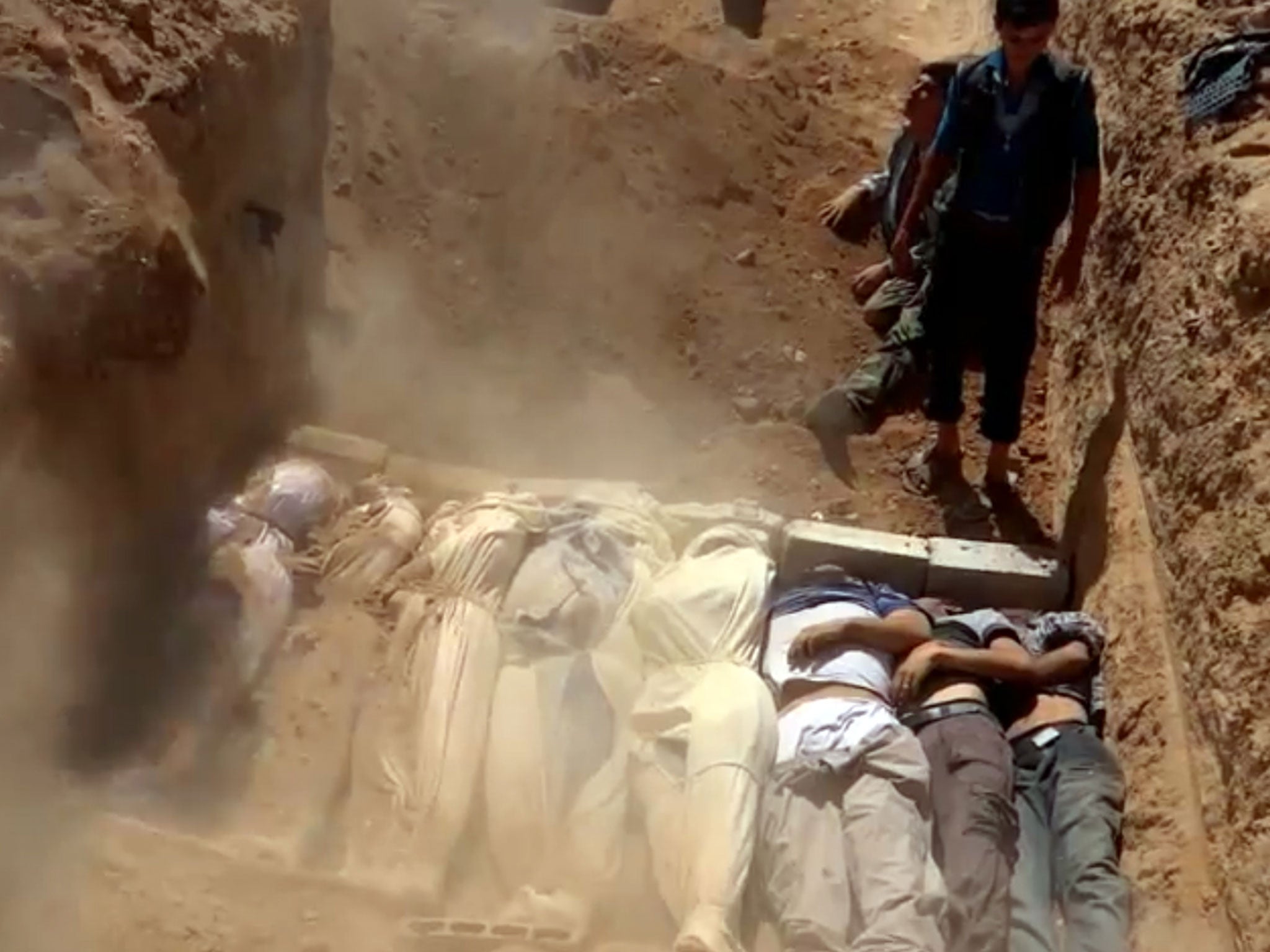 A video uploaded on to YouTube in August 2013 purporting to show a grave containing the bodies of gas attack victims from Ghouta