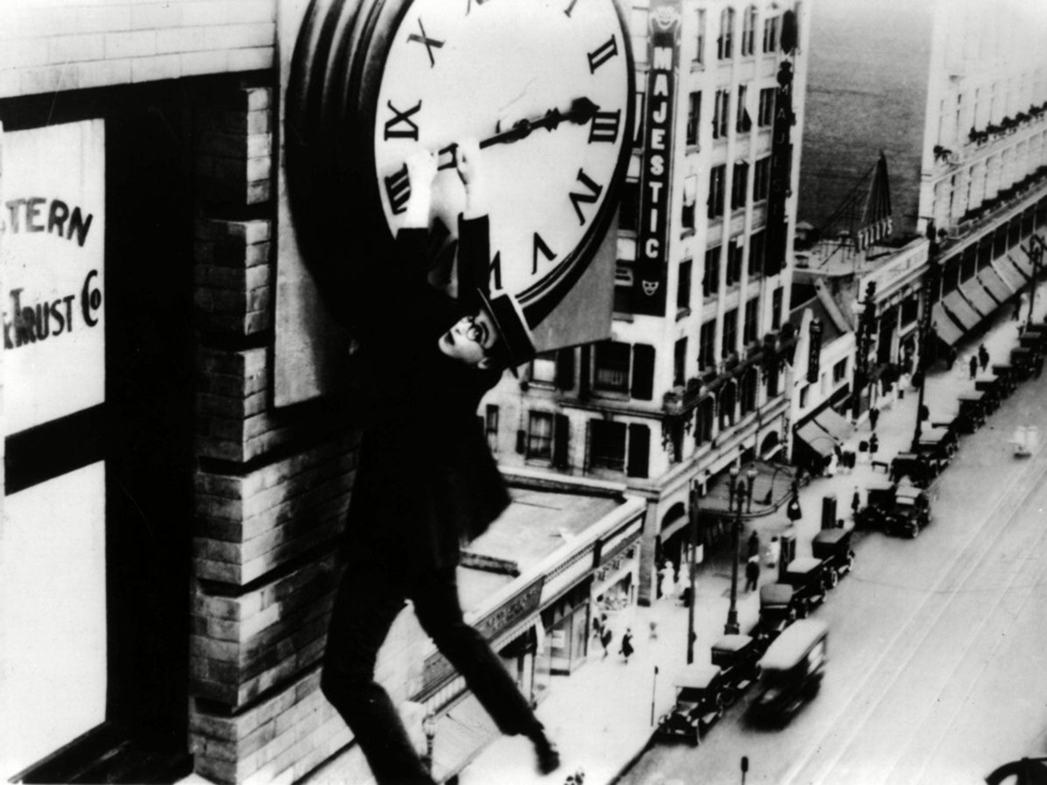 Time on his hands: silent comedian Harold Lloyd grasps the hands of a skyscraper’s clock in his film ‘Safety Last’ from 1923