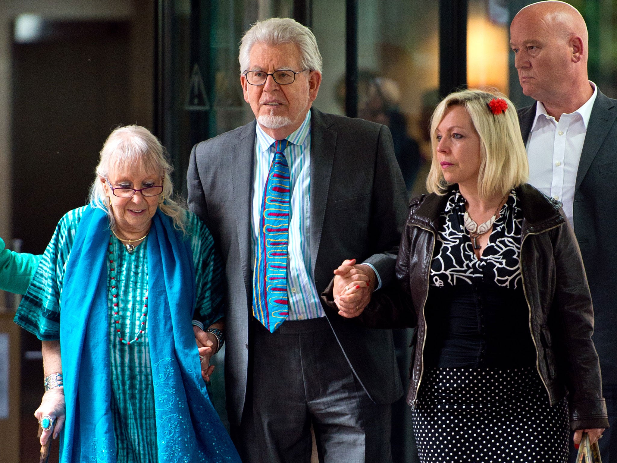 Rolf Harris leaving court with his wife Alwen Hughes and daughter Bindi Harris after being found guilty