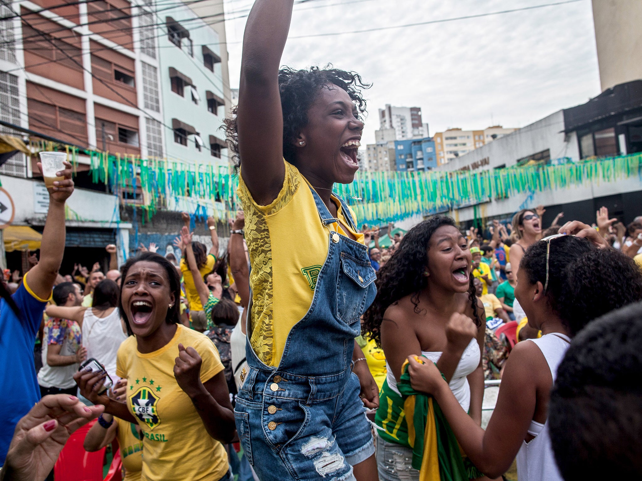 Brazil fans in the streets of Sao Paulo during the win over Chile