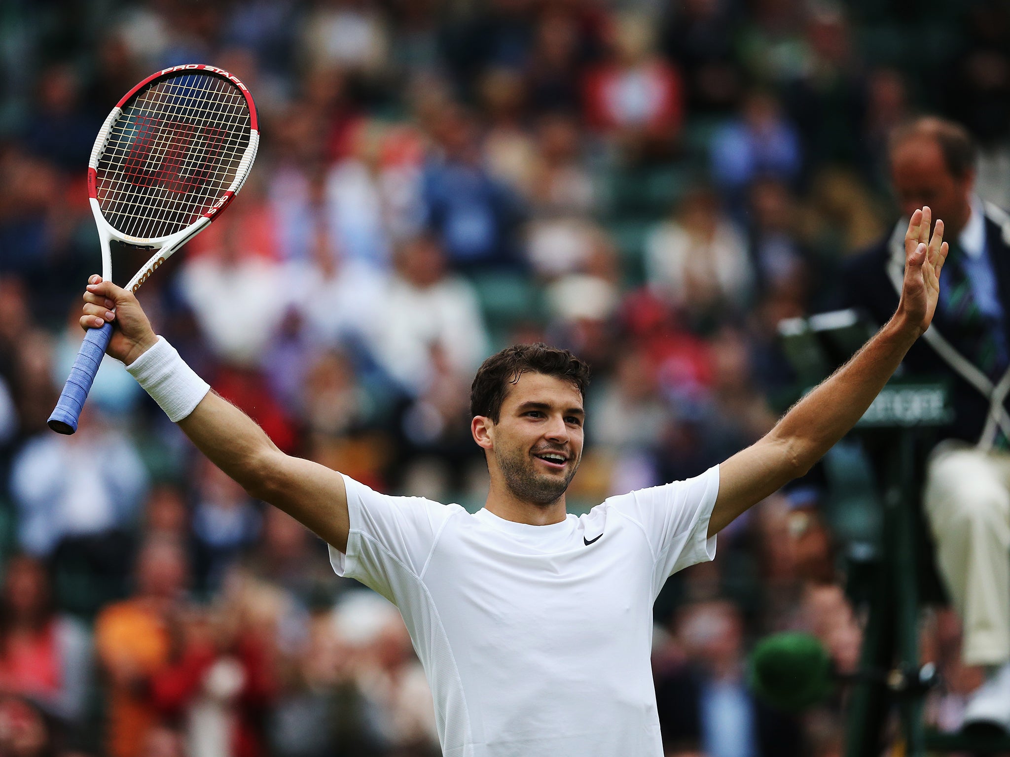 Grigor Dimitrov of Bulgaria celebrates after winning his Gentlemen's Singles fourth round match against Leonardo Mayer