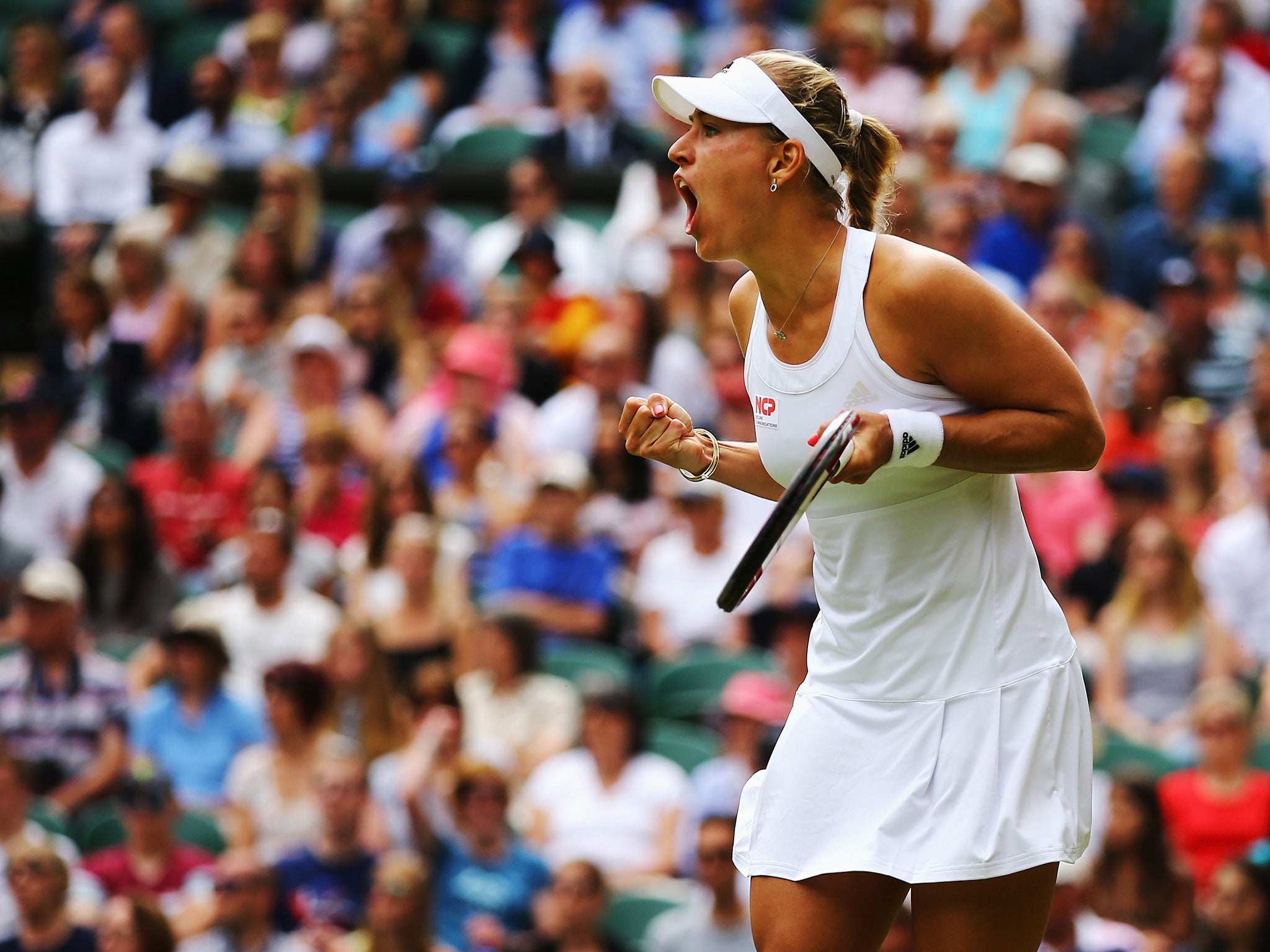 German ninth seed Angelique Kerber celebrates after he win