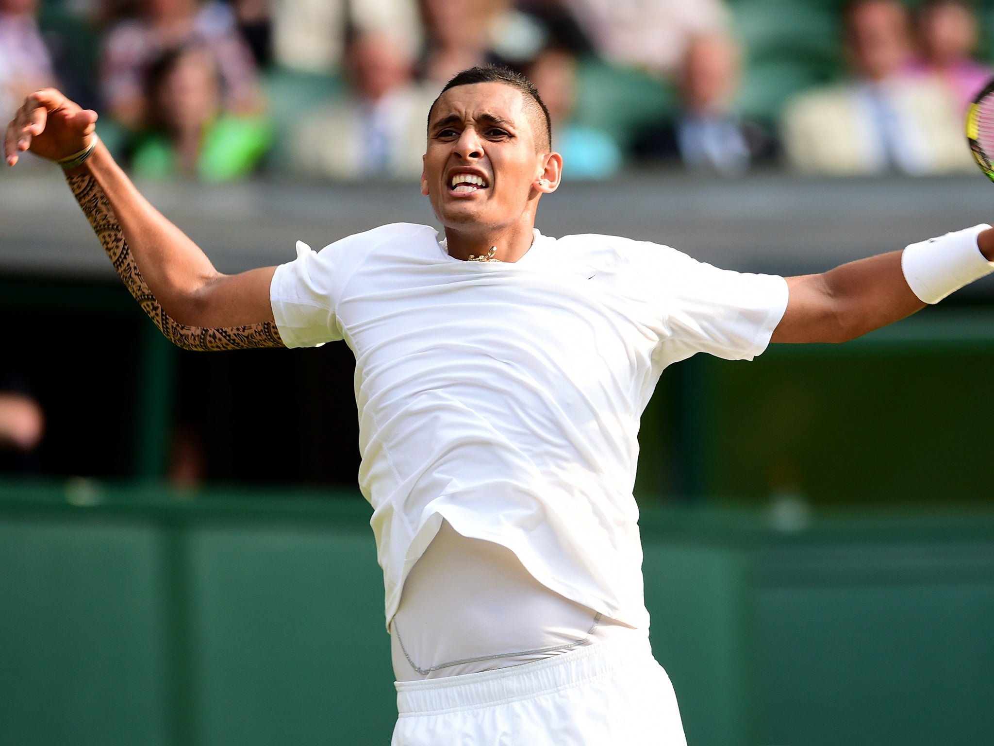 Australia's Nick Kyrgios celebrates winning a game against Spain's Rafael Nadal