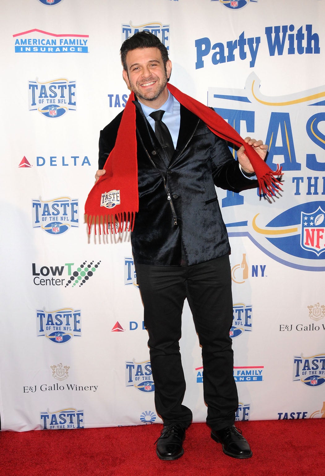 Adam Richman showed off his weightloss at an event in February 2014