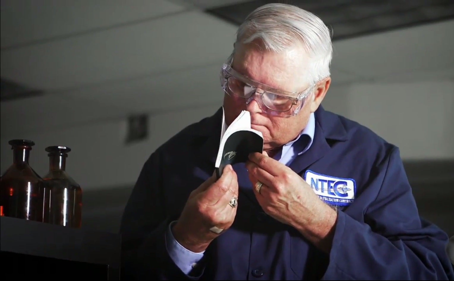 Just a regular day for George Aldrich, sniffing books bound for space